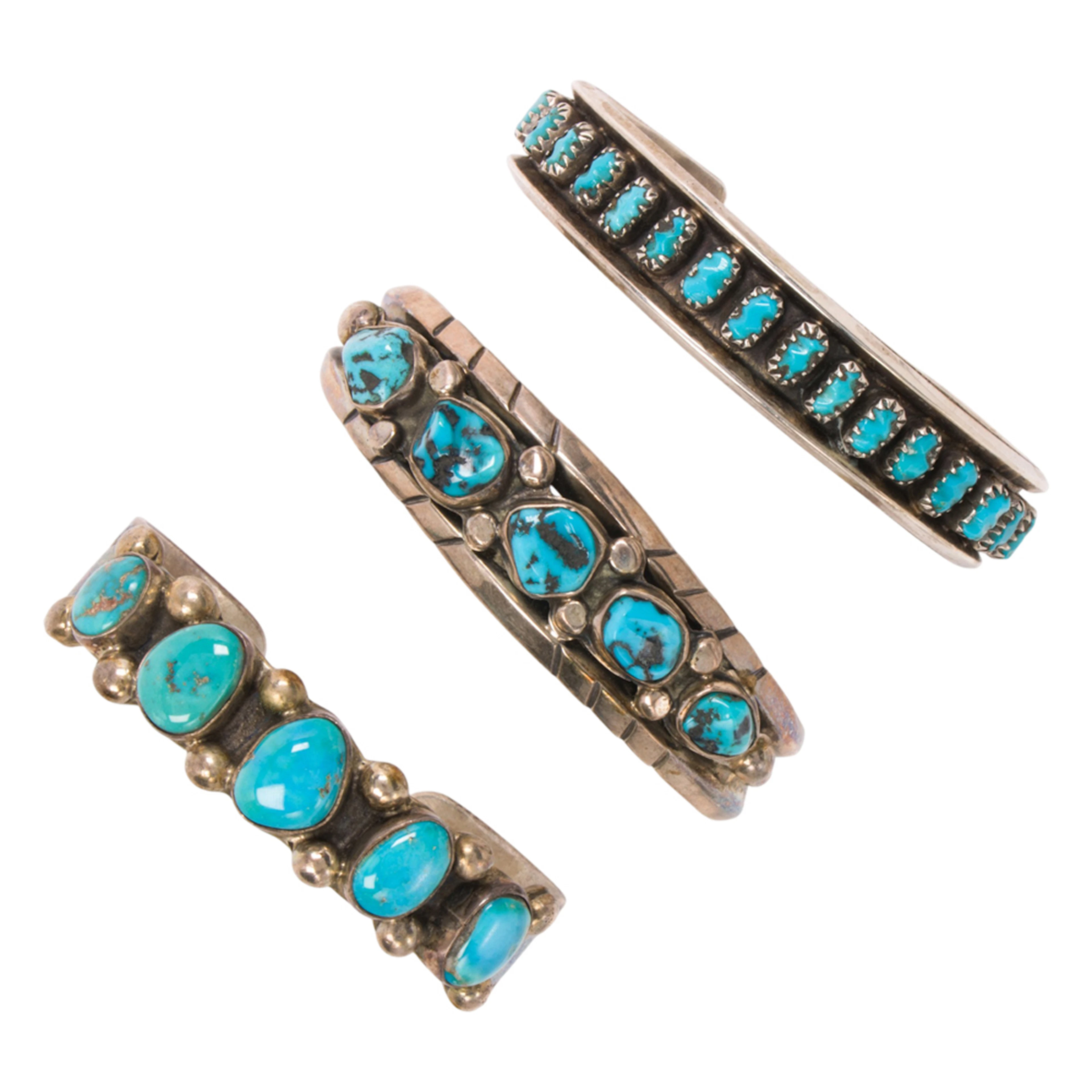 Three Native American turquoise and silver cuffs
