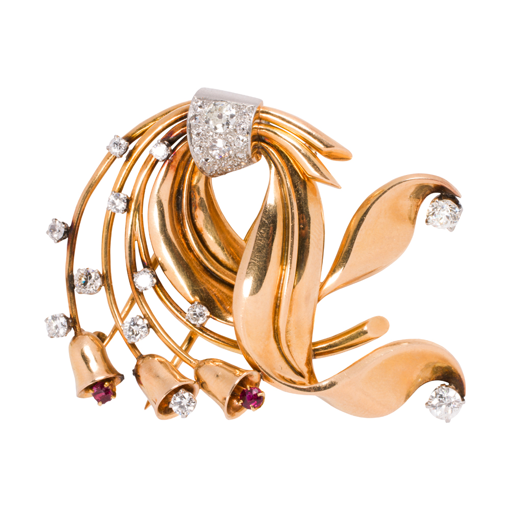 A Retro diamond, ruby and 18k bi-color gold clip brooch