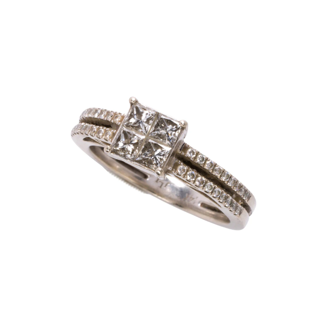 A diamond and 14k white gold ring