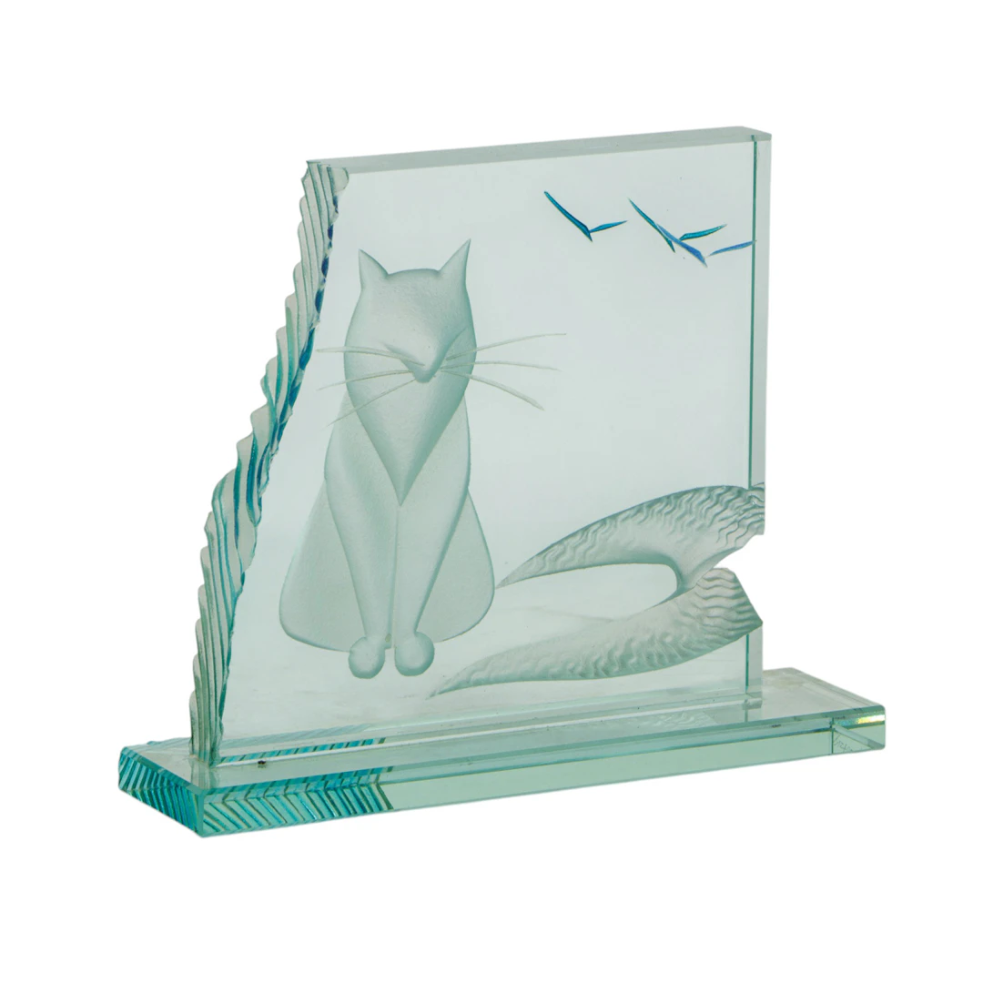 An Alisha Volotzky reverse cut glass plaque of a cat at the shore