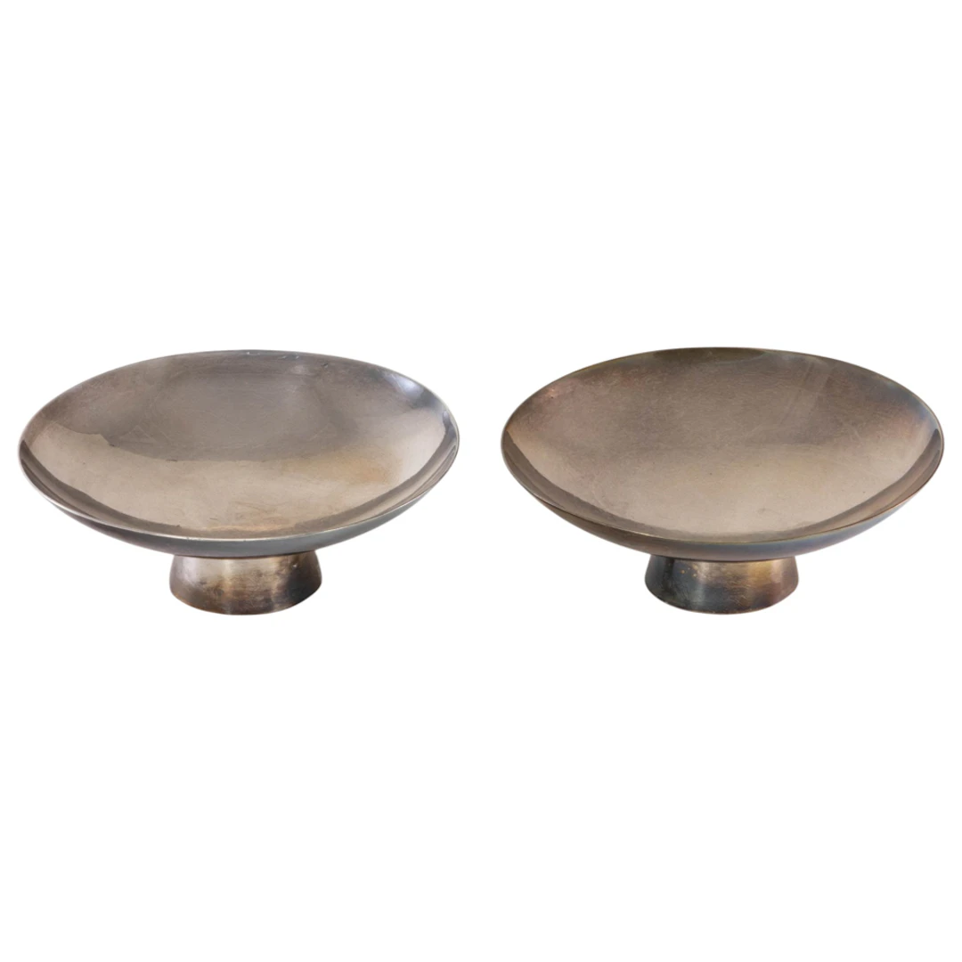 A pair of Japanese silver sakezuki (ceremonial cups)