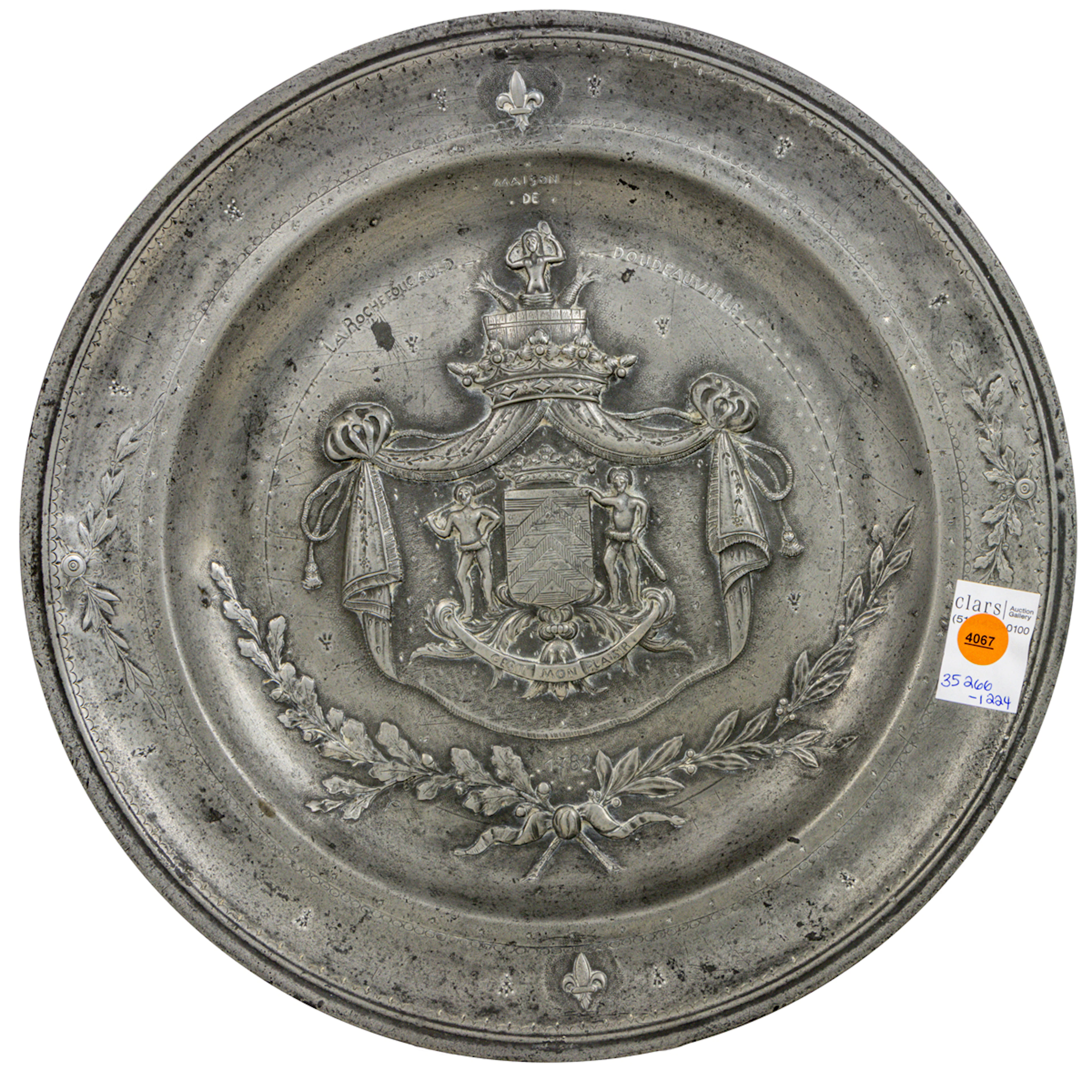 A French pewter armorial charger for Maison de La Roche Foucauld-Doudeauville