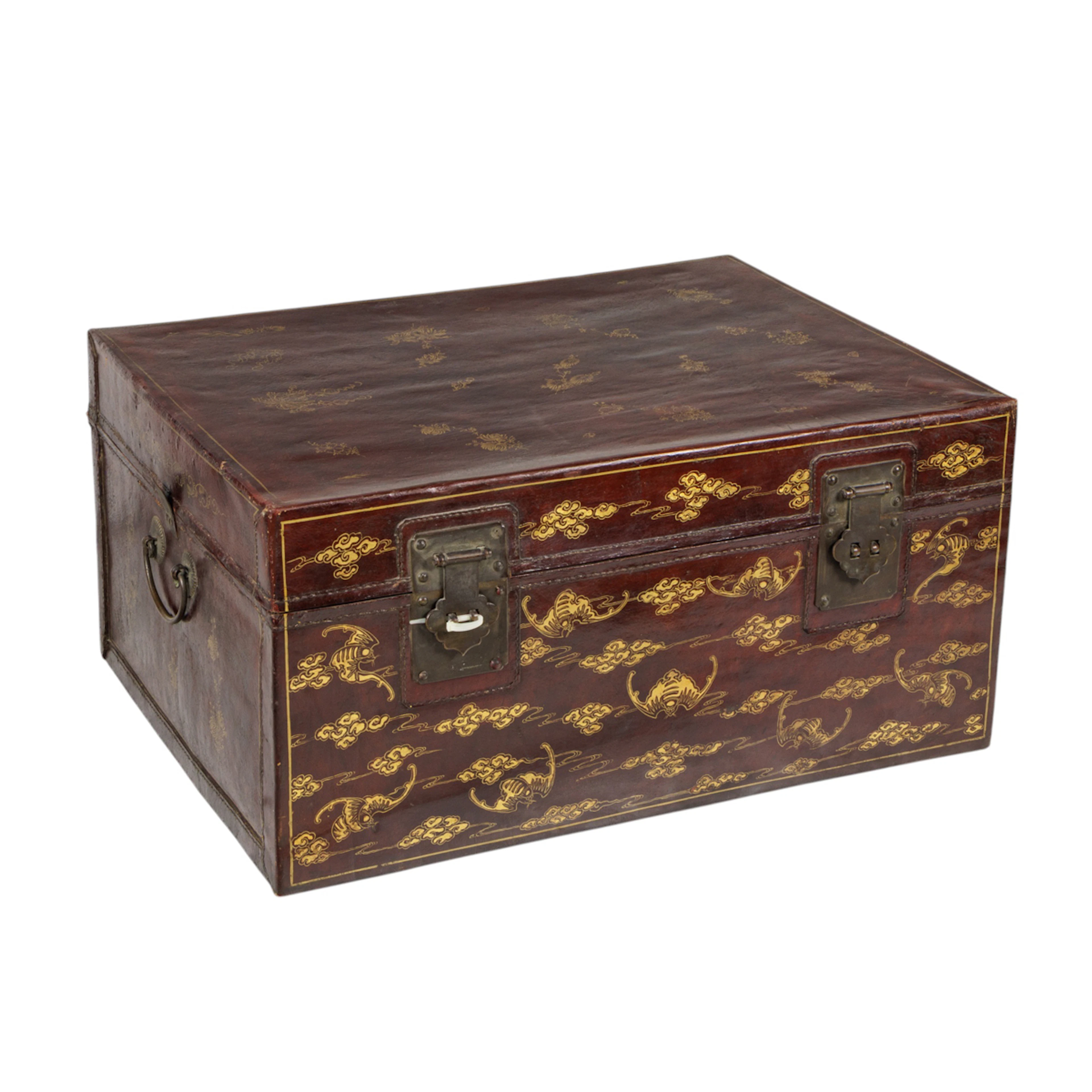 A Chinese red leather wedding trunk