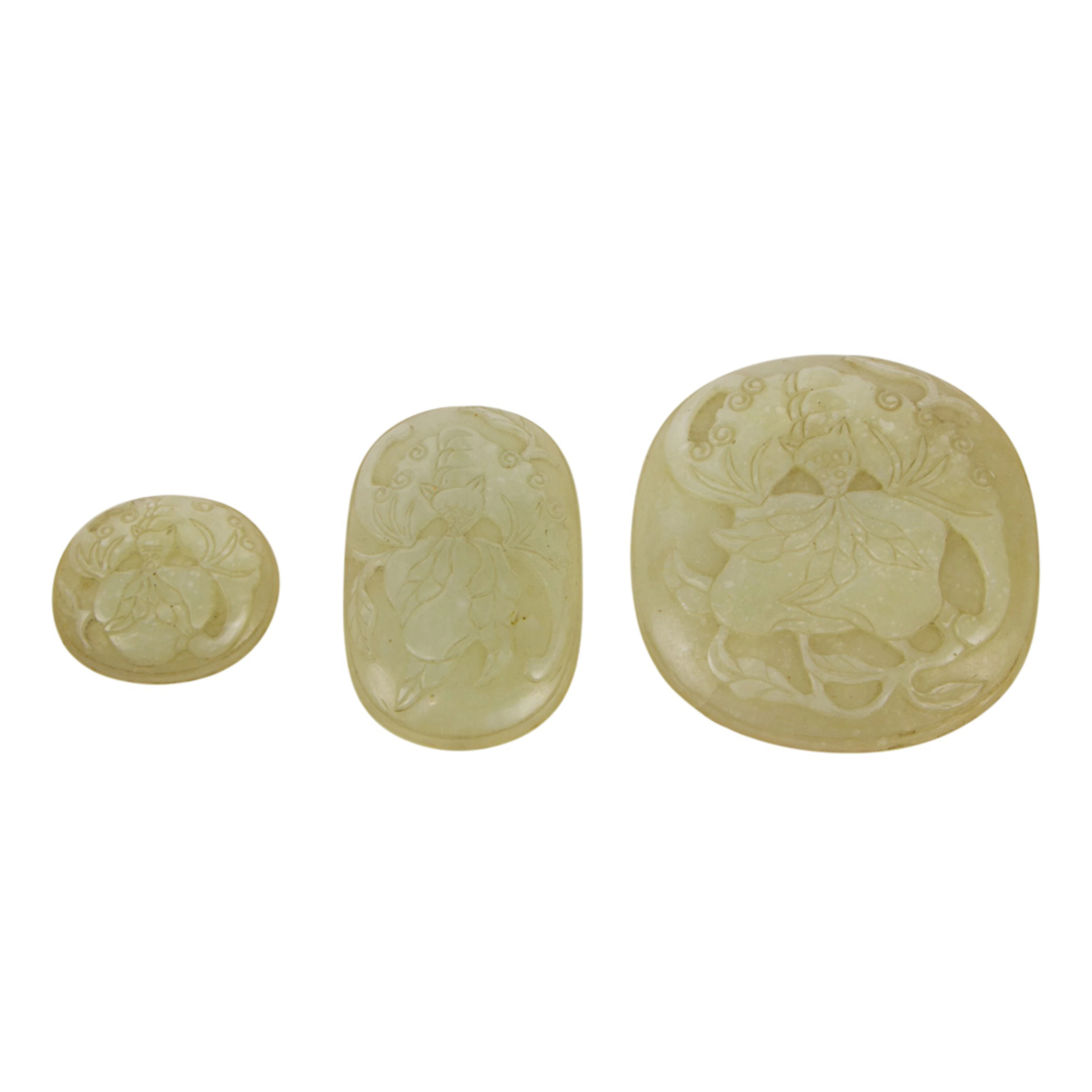 A set of three Chinese white jade ruyi scepter plaques