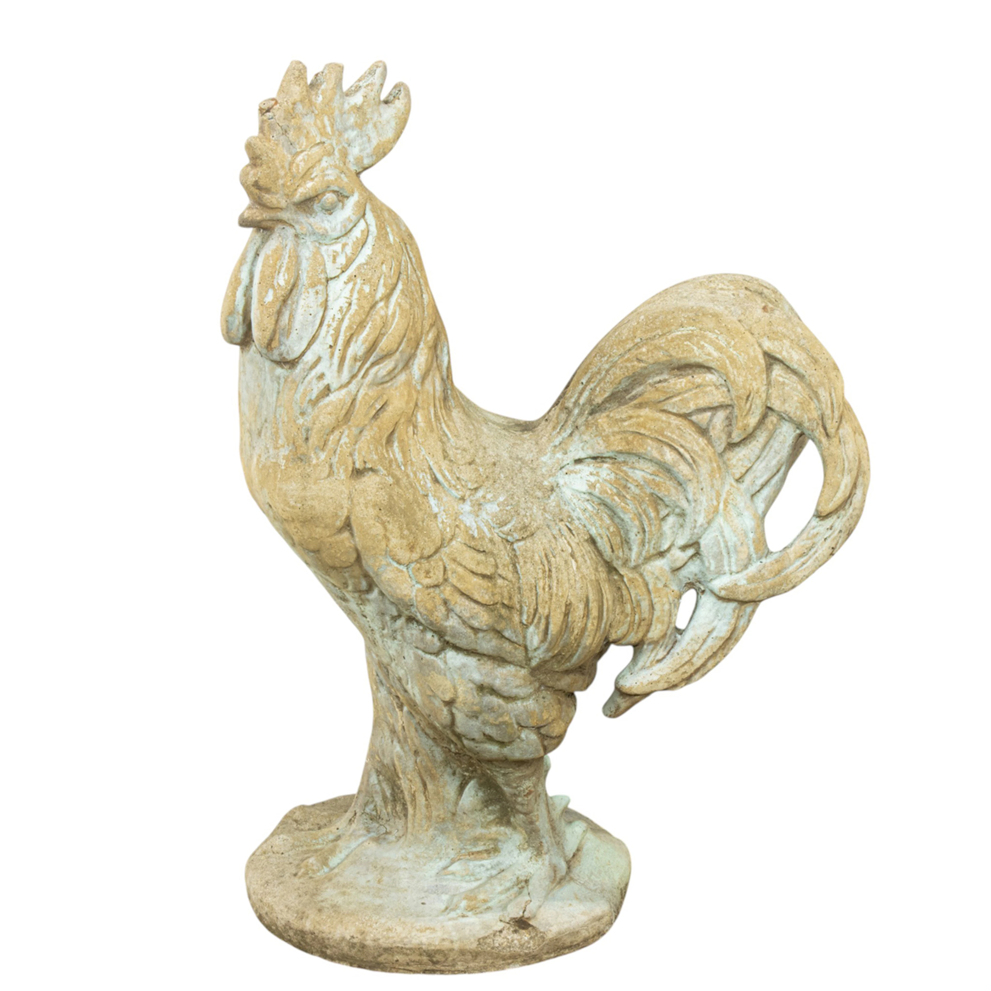 A vintage cast stone rooster