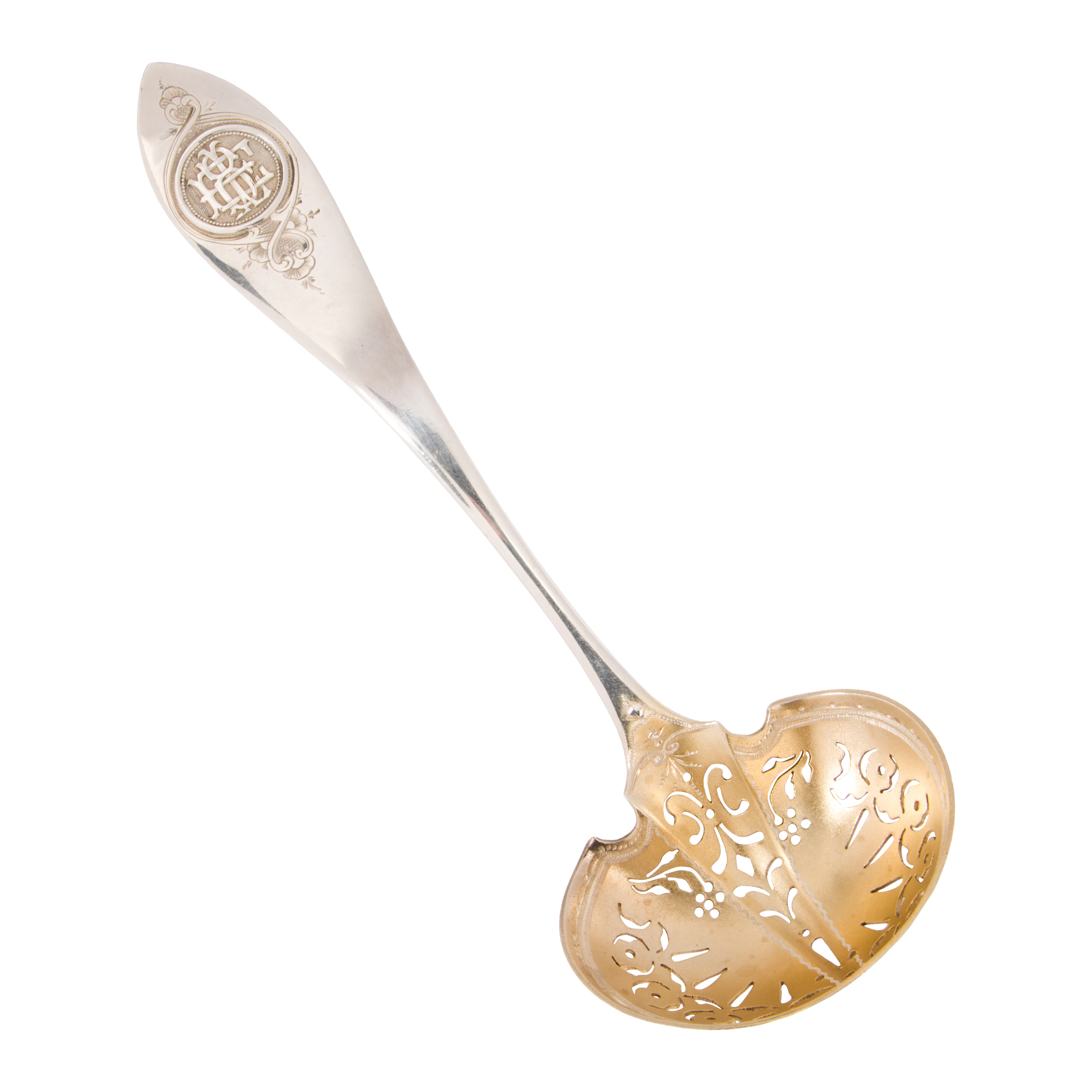 A parcel-gilt coin silver sugar sifting ladle with custom monogram