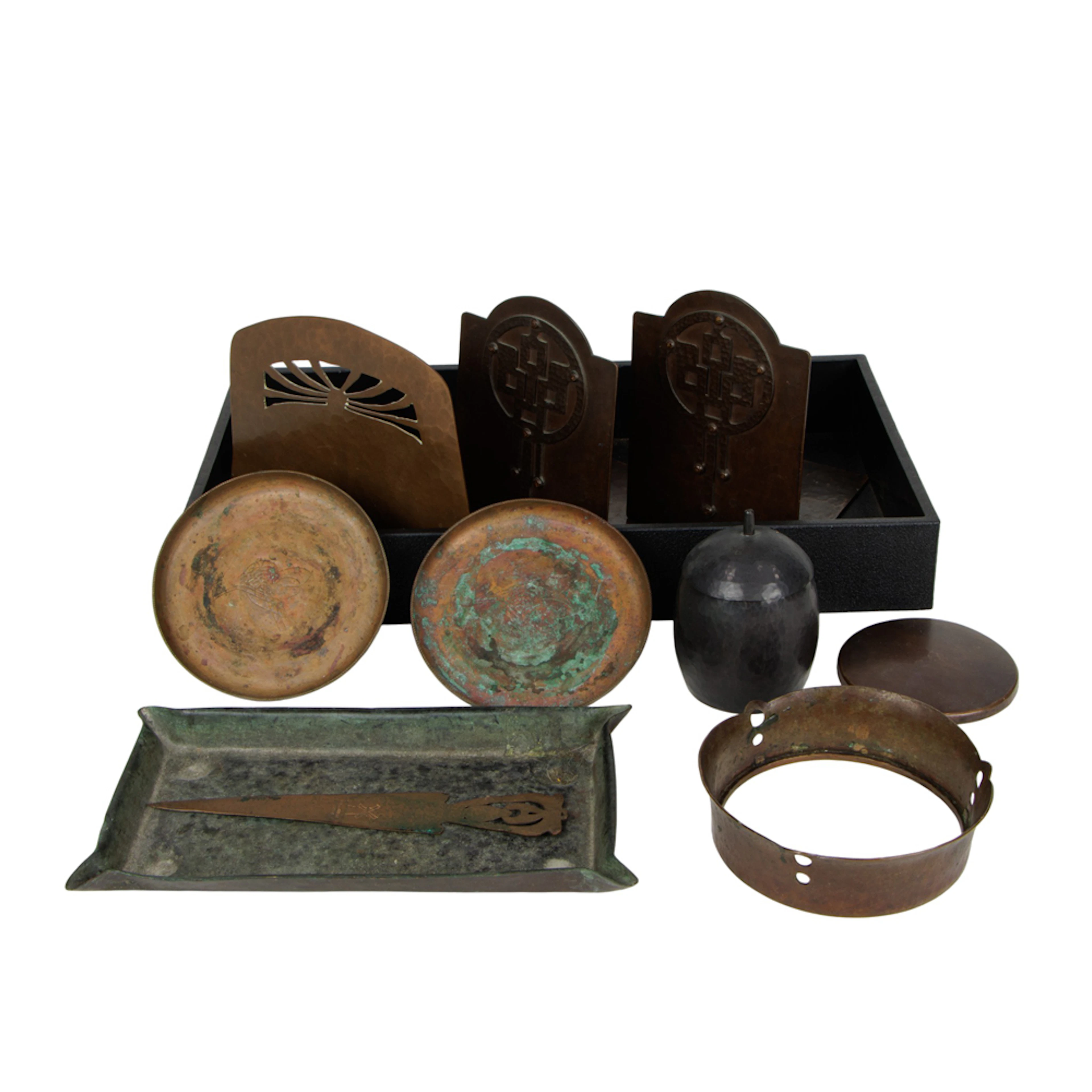 A group of Arts and Crafts copper table articles