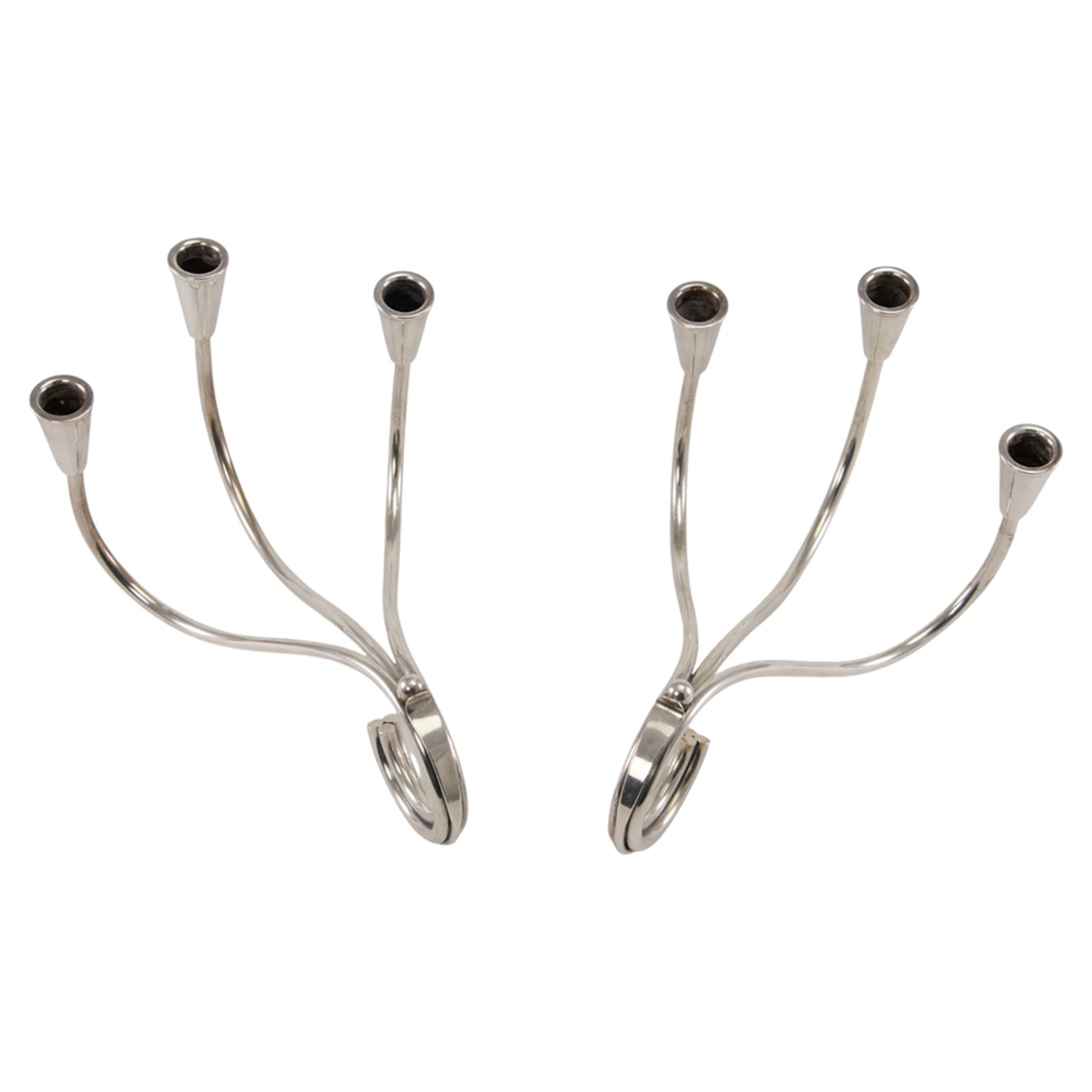 A Danish plated pair of three light taper candelabra, design of Carl