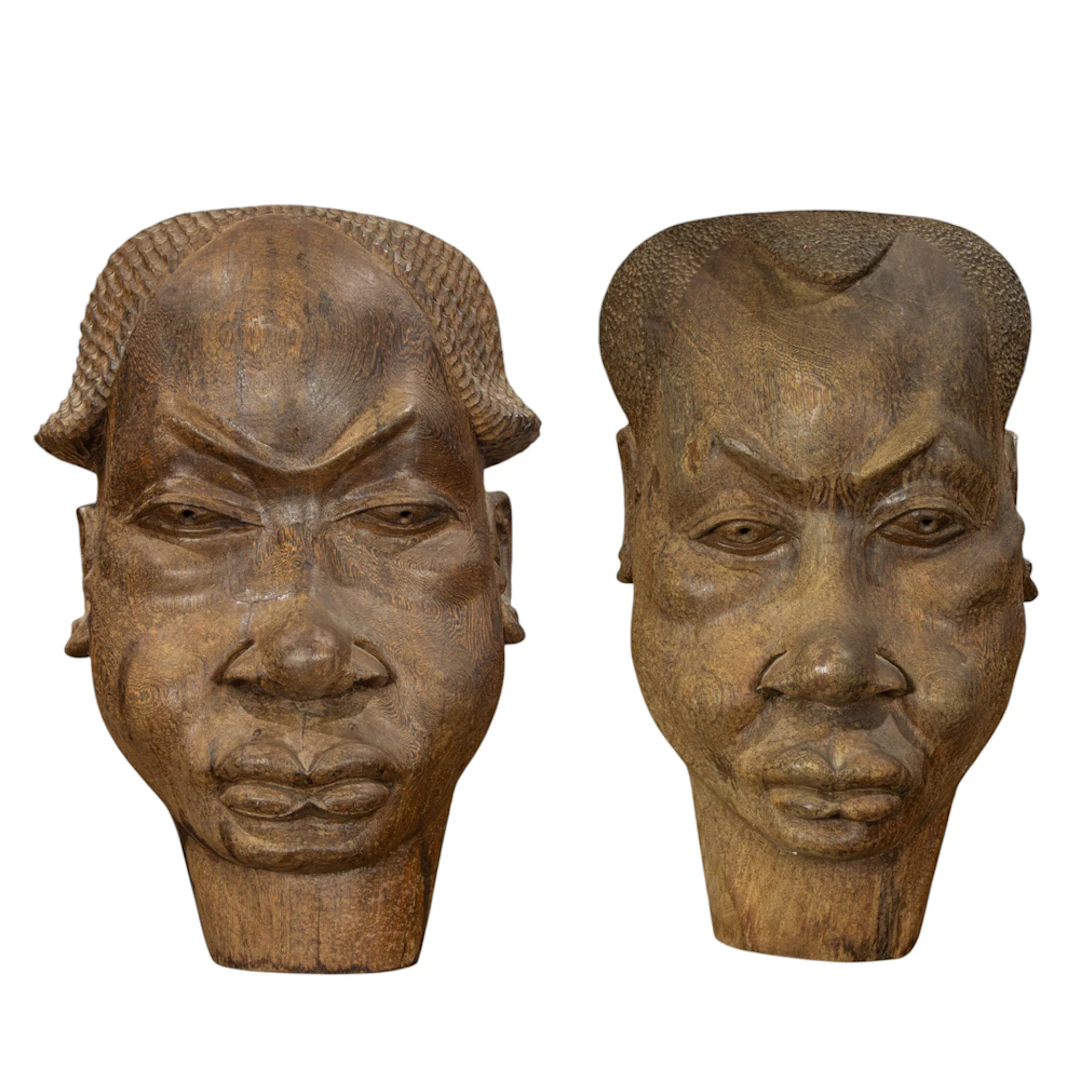 Two Congolese carved ironwood heads