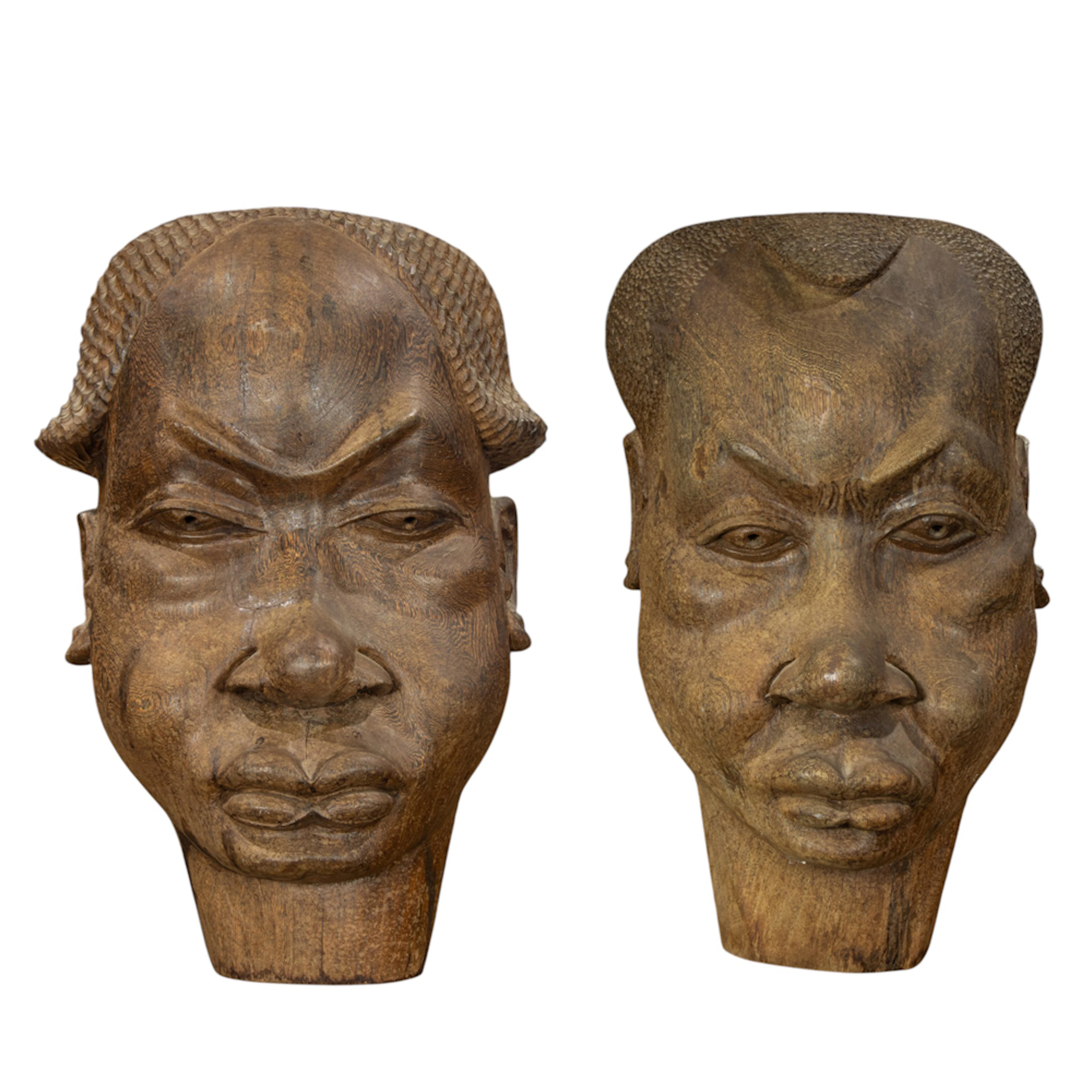 Two Congolese carved ironwood heads