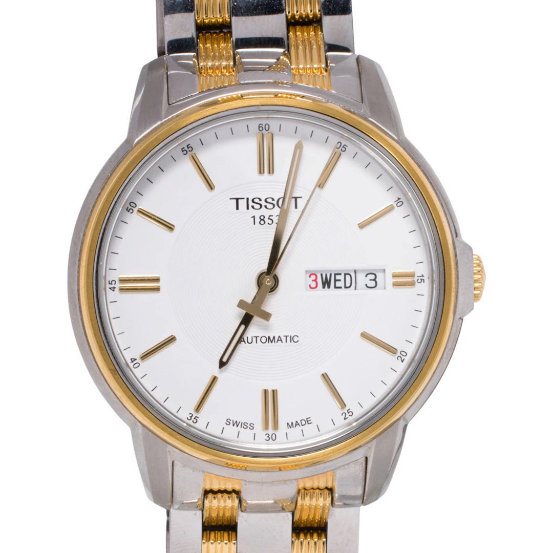 A Tissot Automatic III stainless steel watch