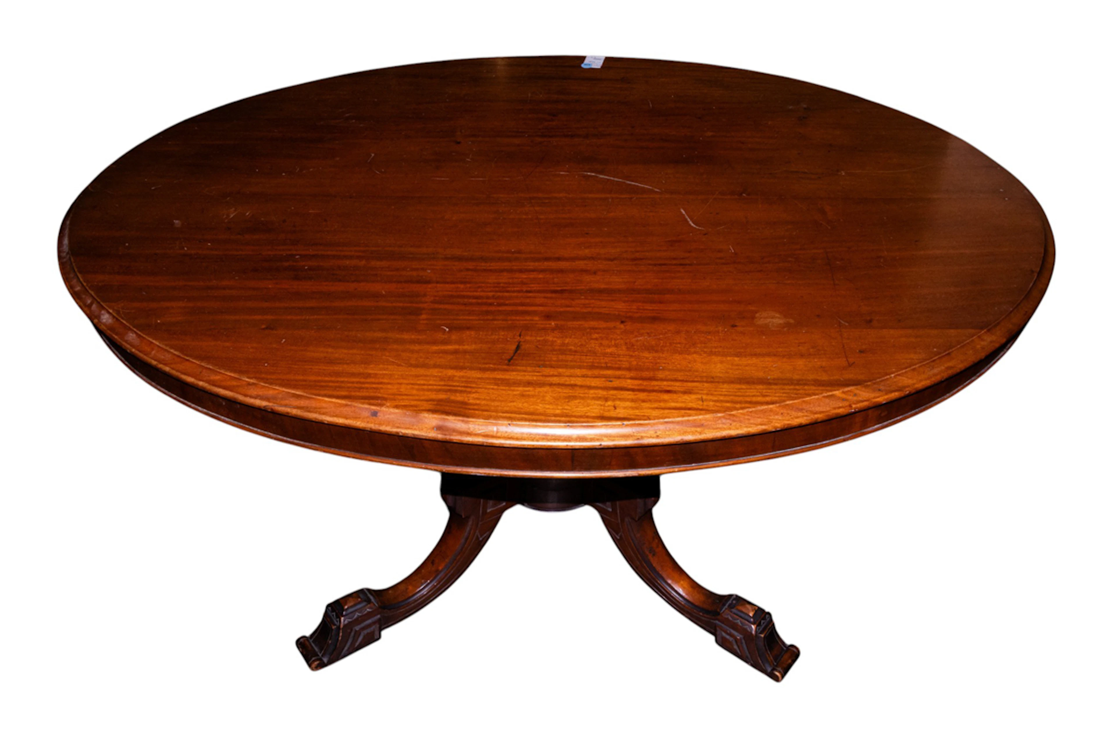 A Victorian oval pedestal table