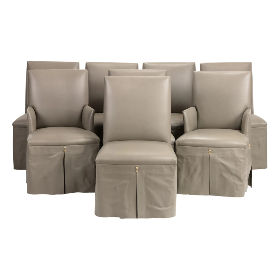 A set of eight custom desgned Italian leather upholstered dining chairs