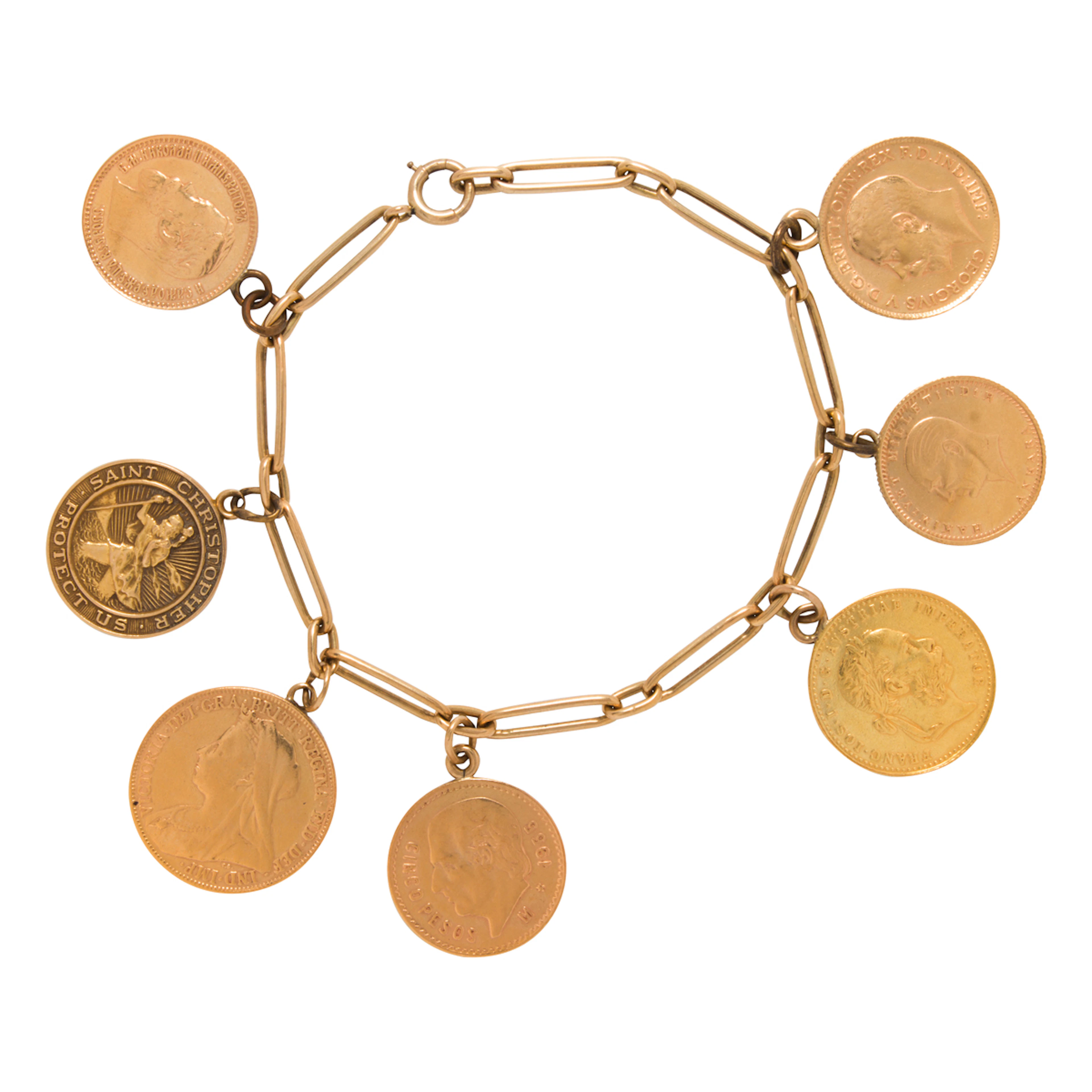 A gold coin and 18k gold bracelet