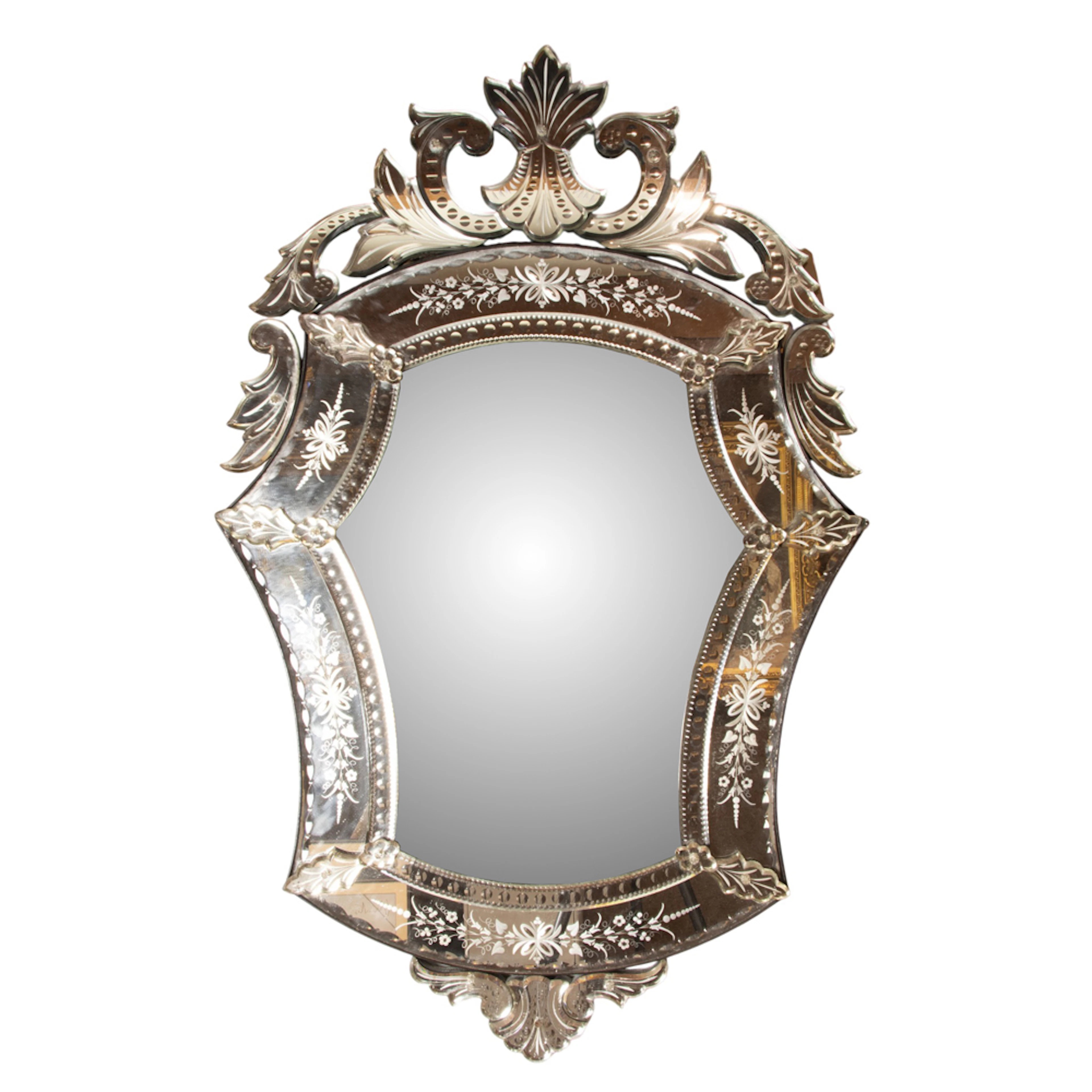 A Venetian reverse engraved glass mirror