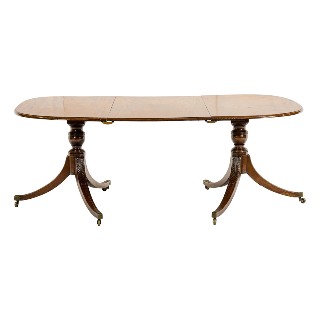A Regency mahogany double pedestal dining table