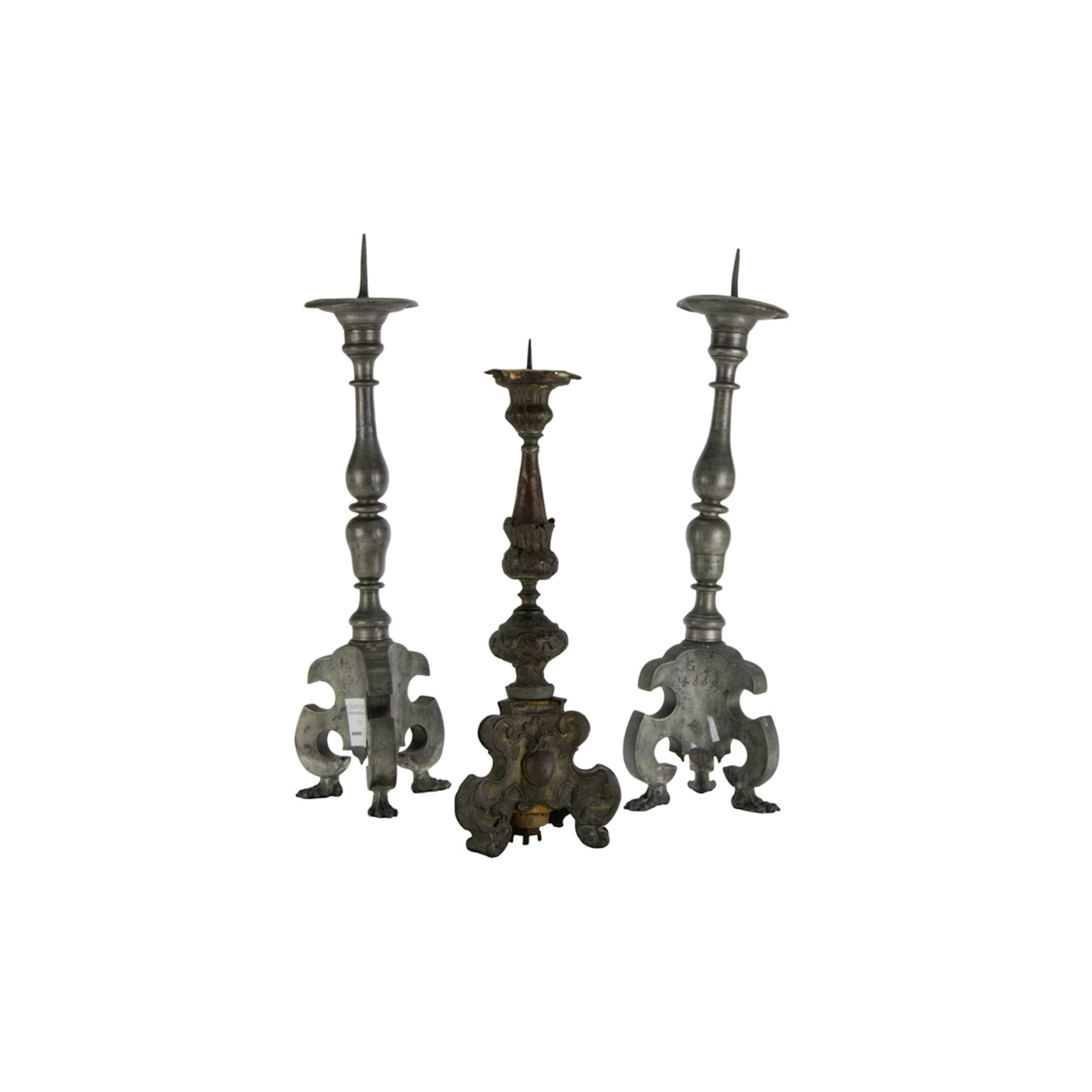 A pair of Continental Baroque pewter candle prickets