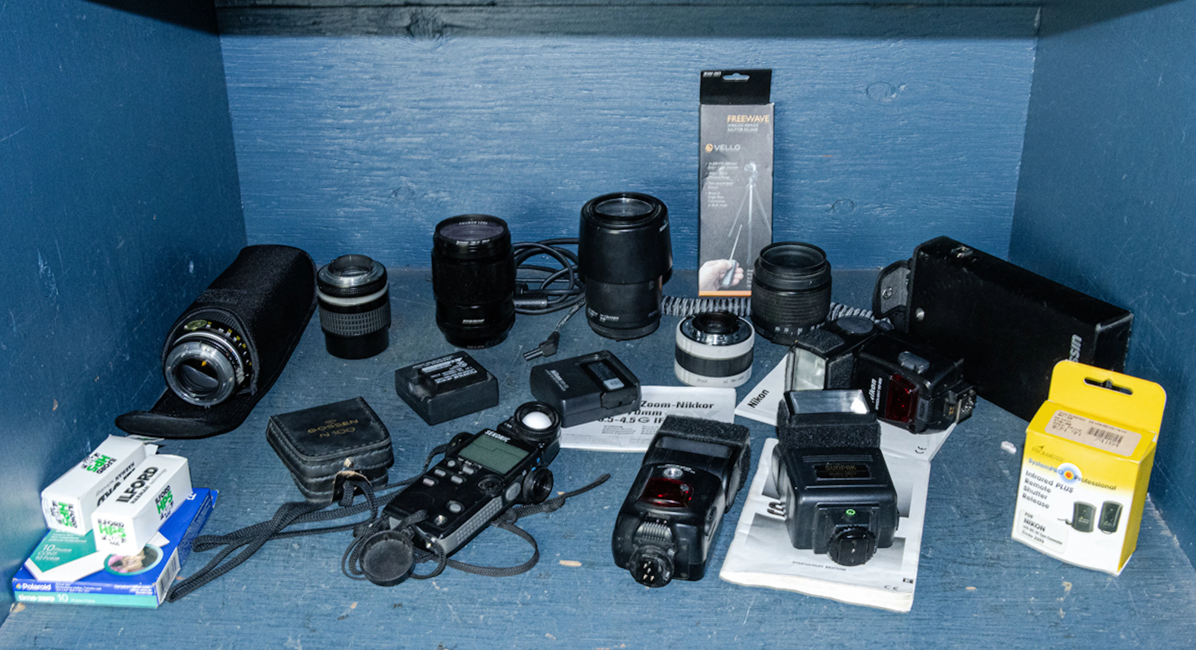 A group of camera lens and other accessories