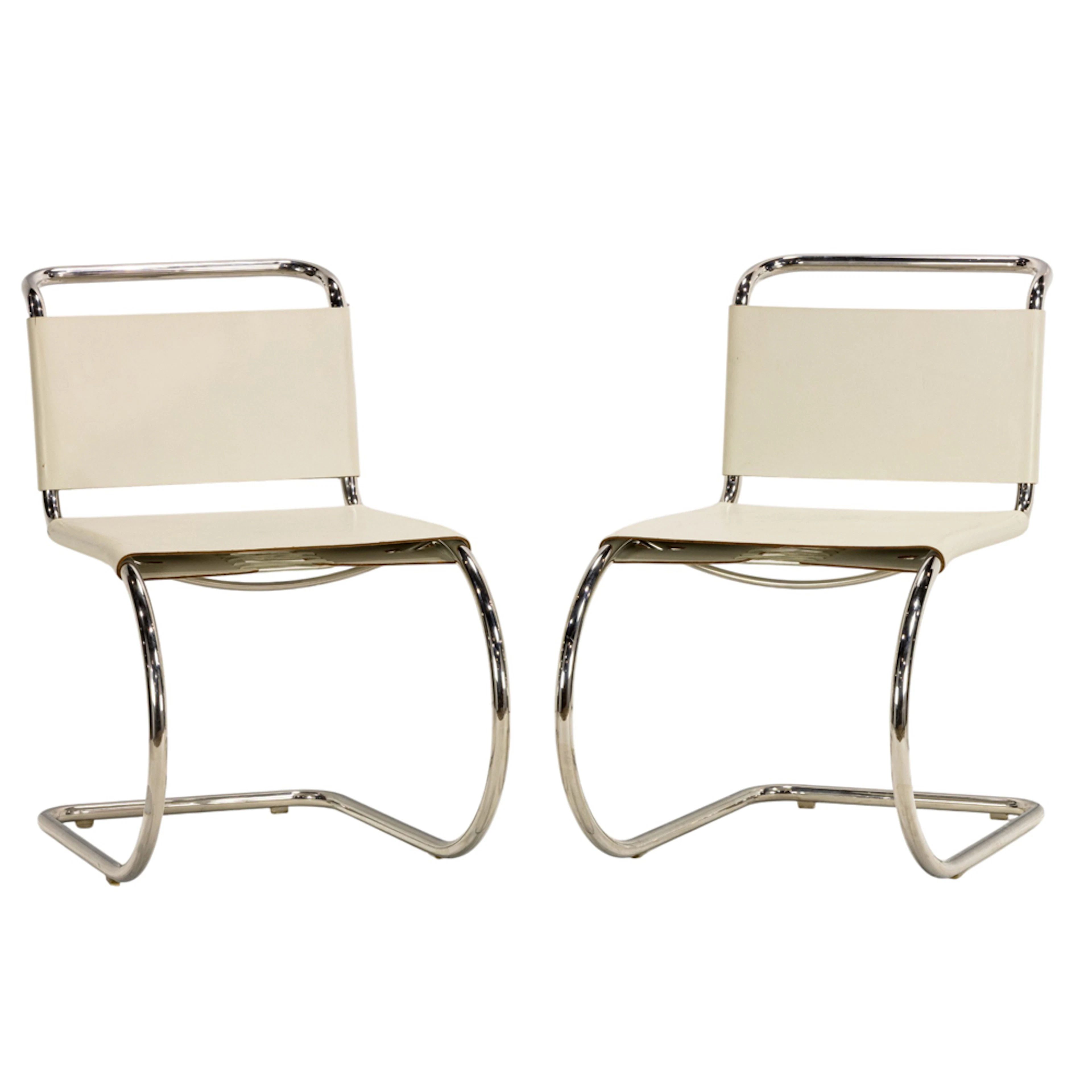 A pair of Mies van der Rohe MR10 white leather chairs