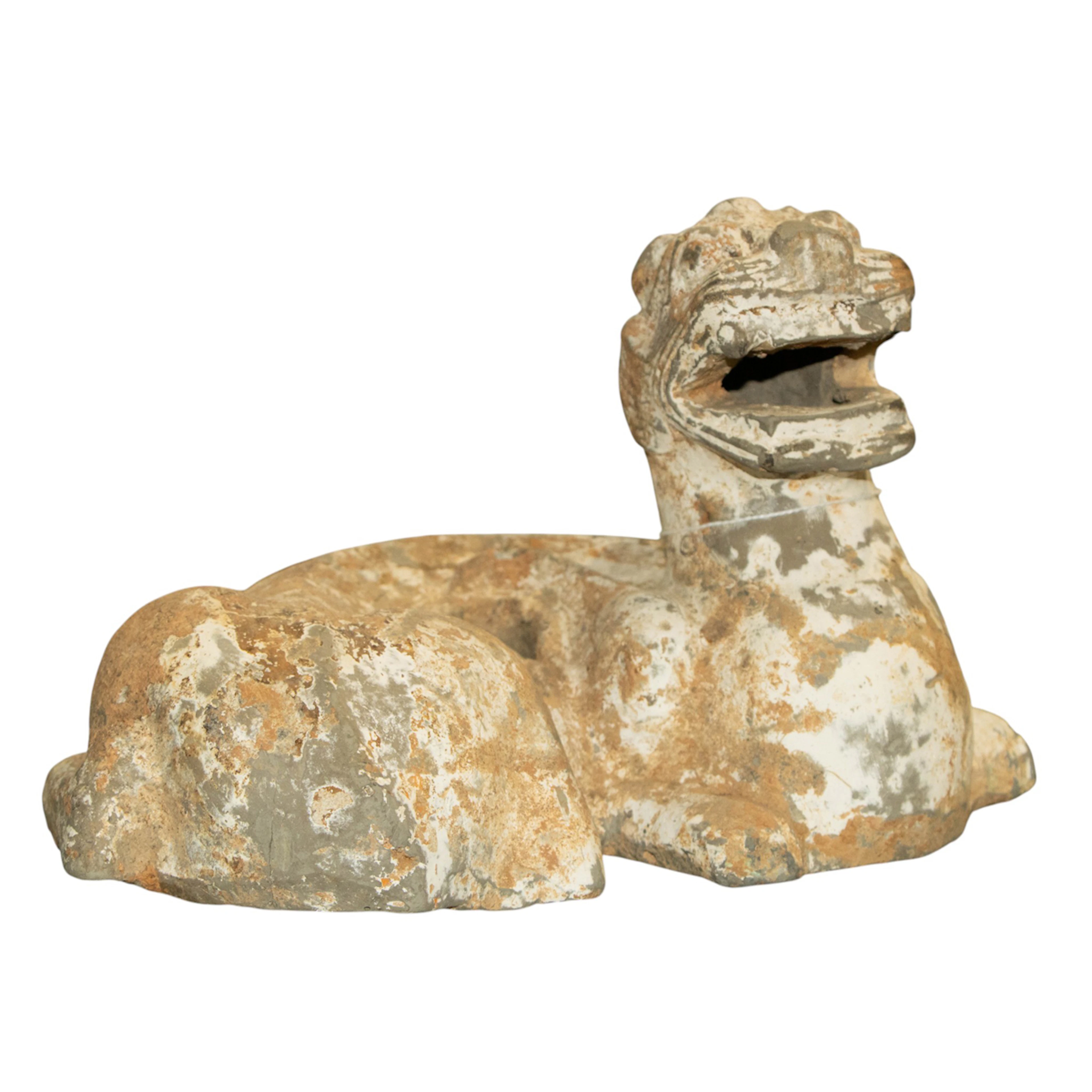 A Chinese grey pottery figure of a mythical beast