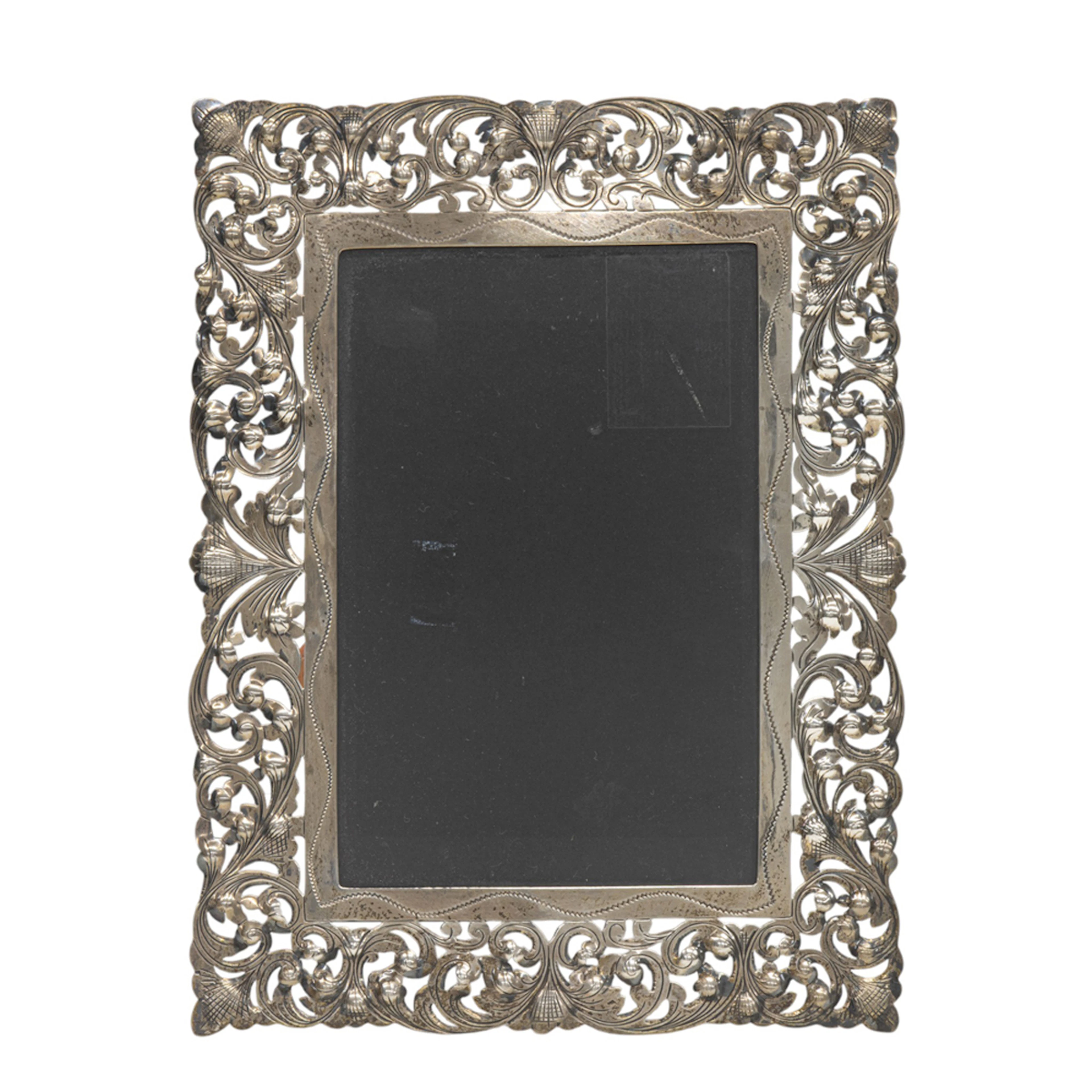 A silver reticulated photograph frame