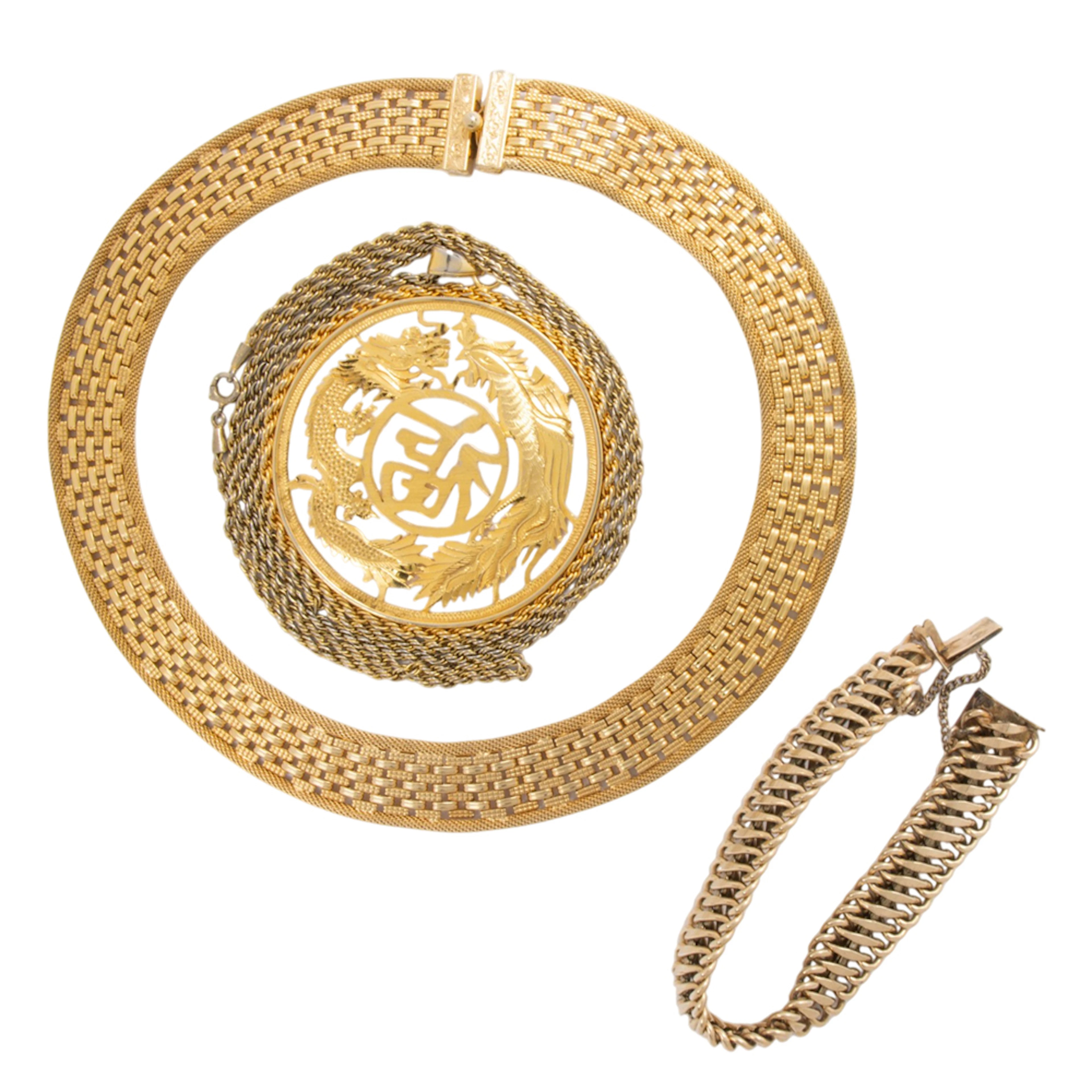 A group of gold-tone jewelry