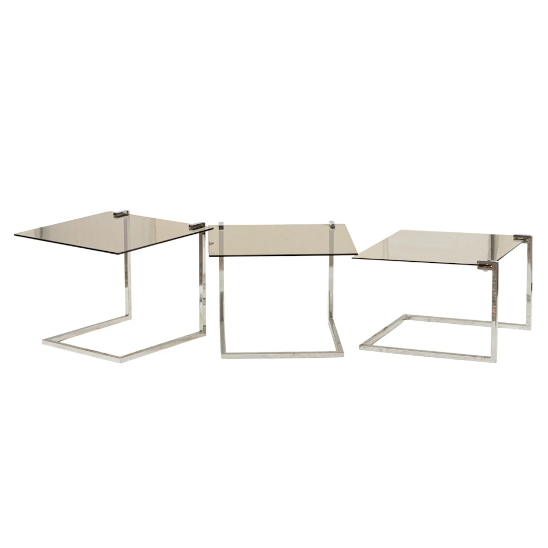 Three Mid-Century Modern smoked glass and chromed metal nesting tables