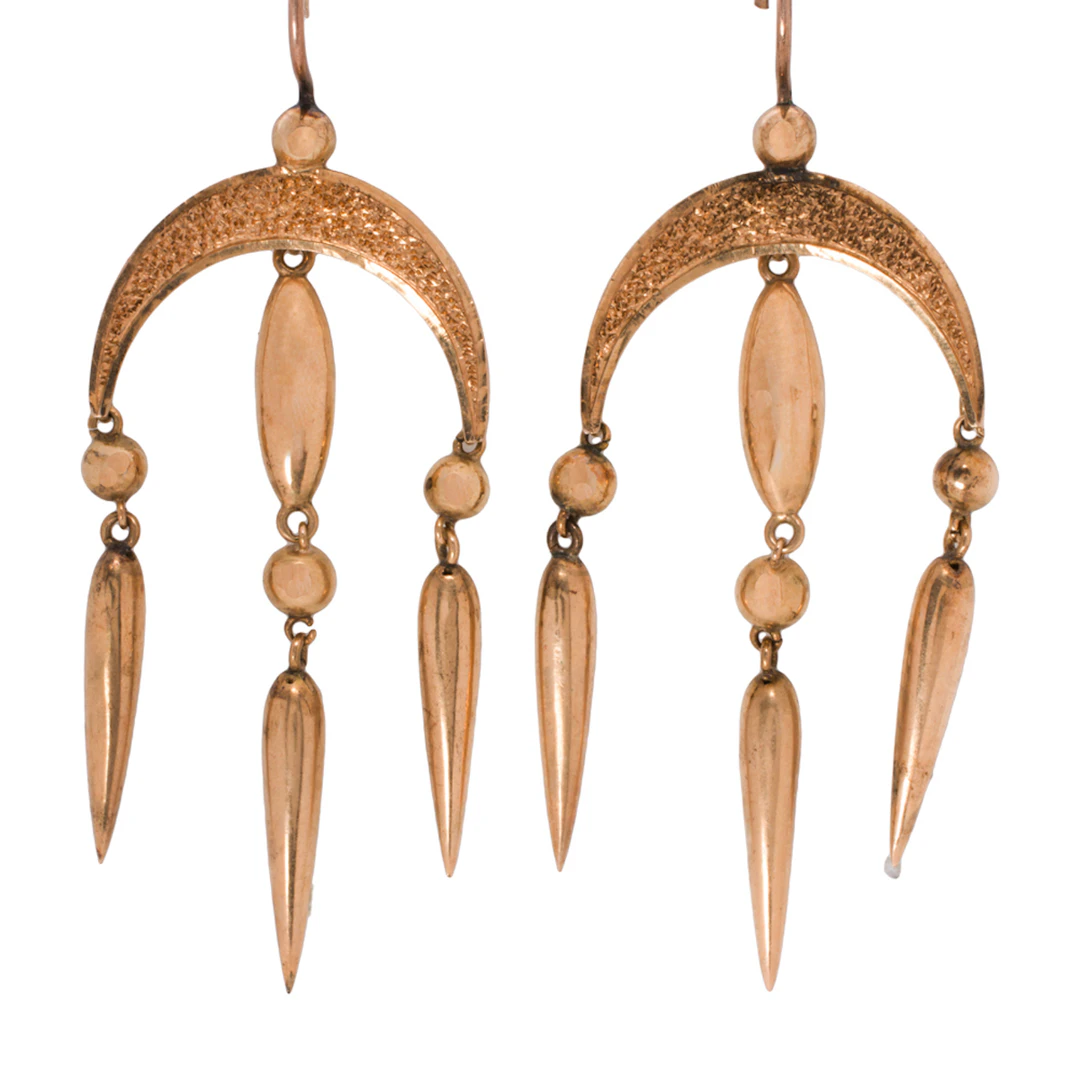 A pair of antique 14k gold earrings
