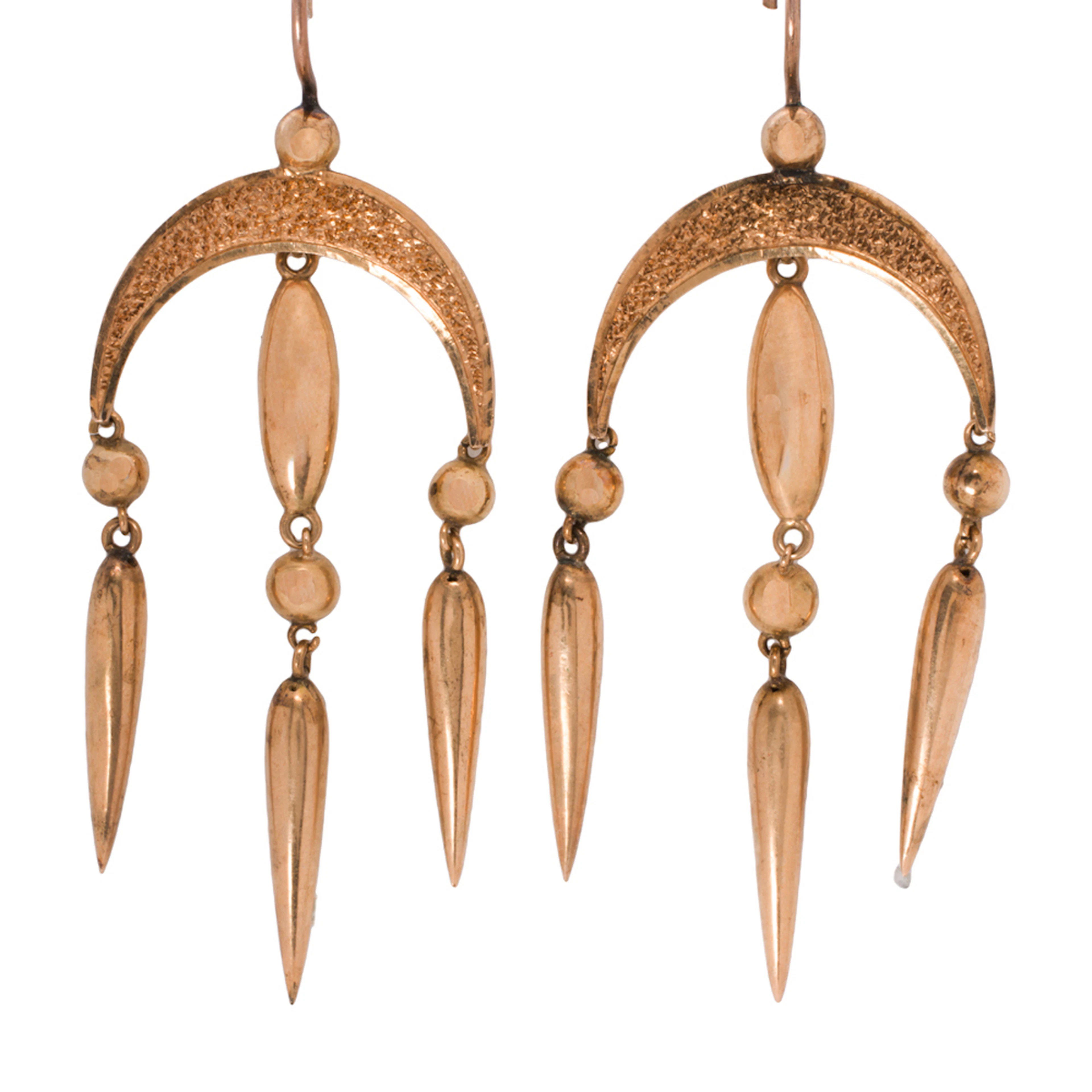 A pair of antique 14k gold earrings