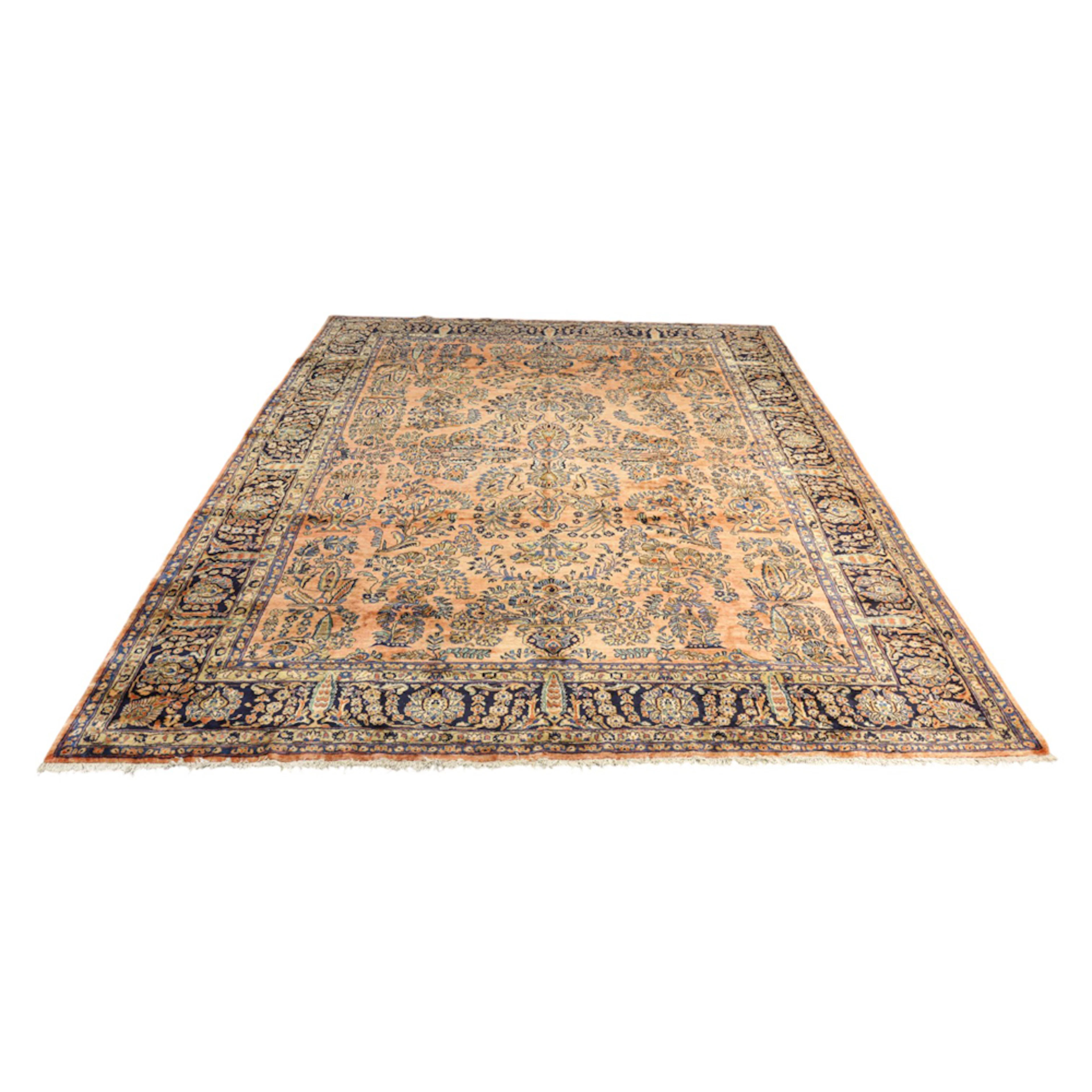A Persian Sarouk carpet
