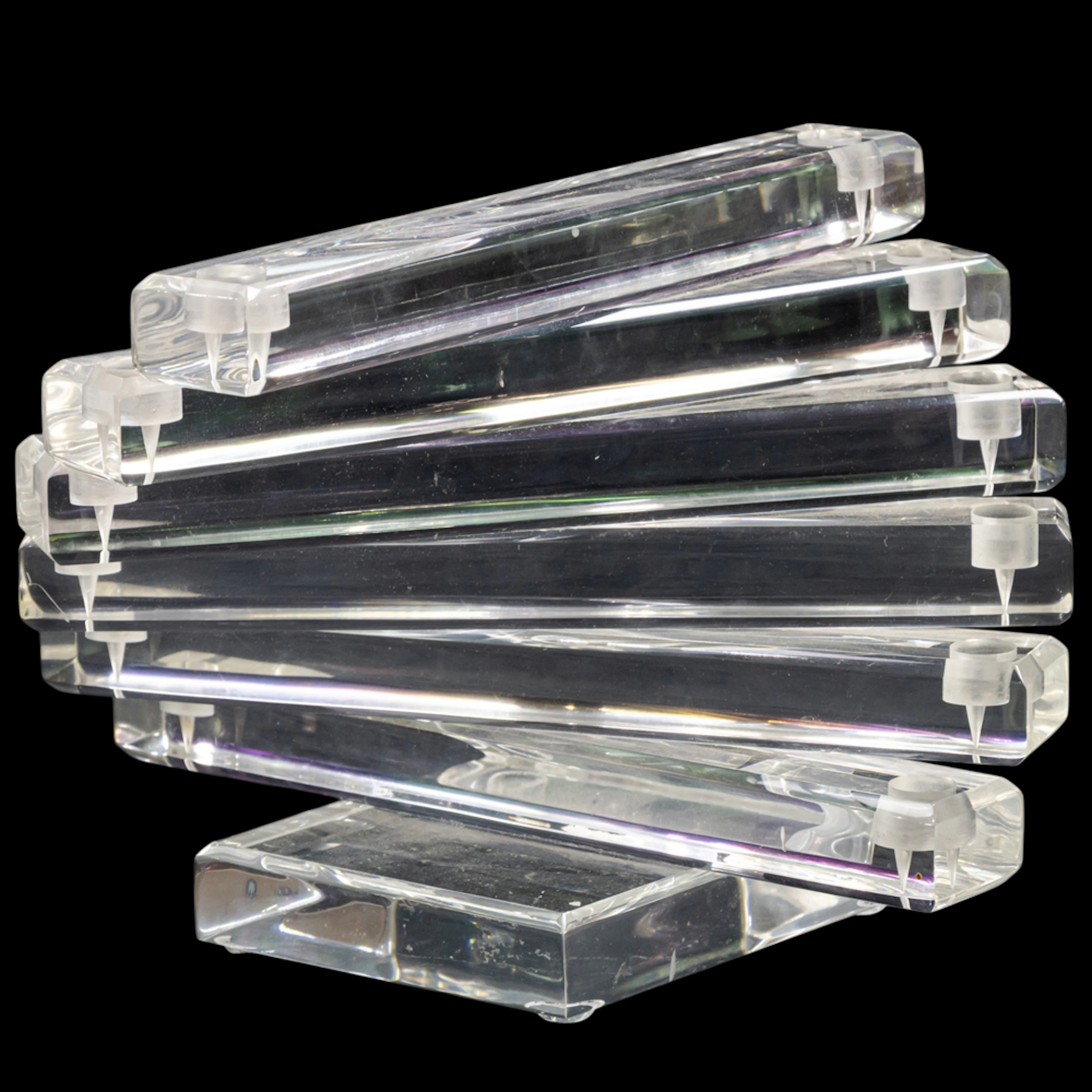 A vintage stacked lucite twelve-light candelabra