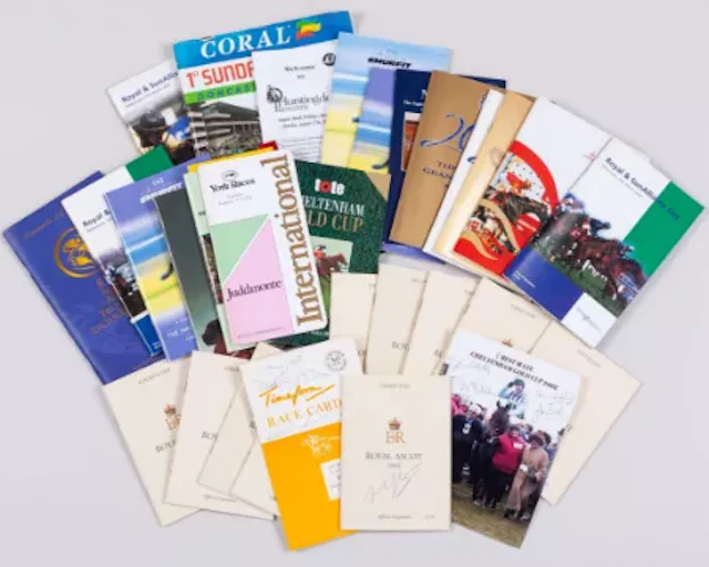 Racecards including autographed examples