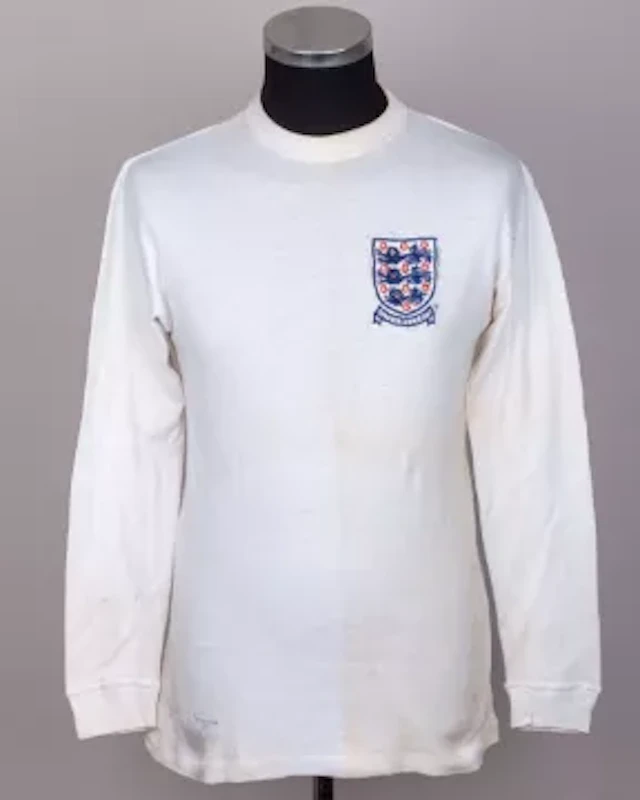 Emlyn Hughes a white No.3 England Under 23 match worn long-sleeved shirt