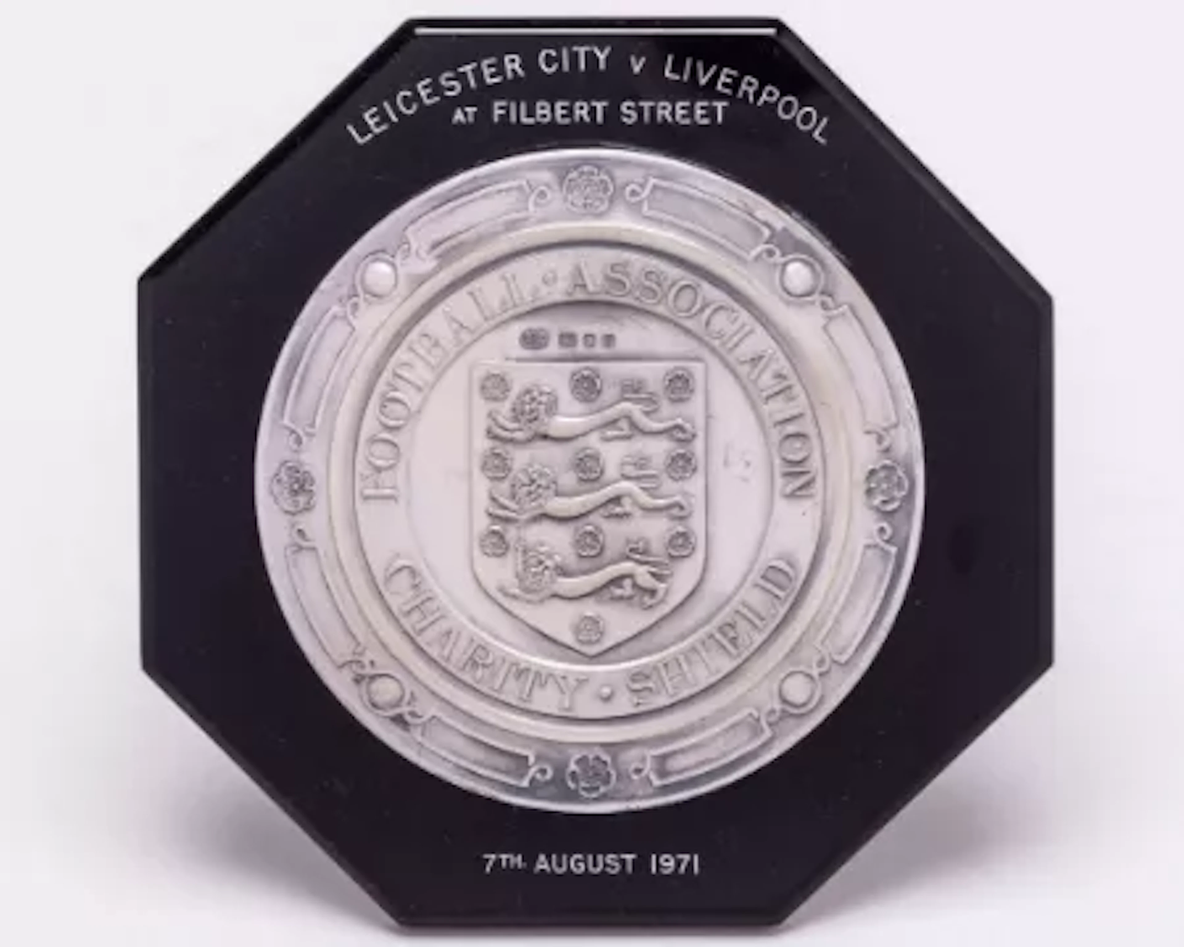 Emlyn Hughes a black bakelite and silver-mounted Charity Shield plaque, 1971