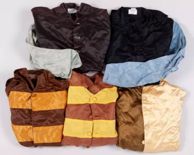 Four sets of vintage racing silks