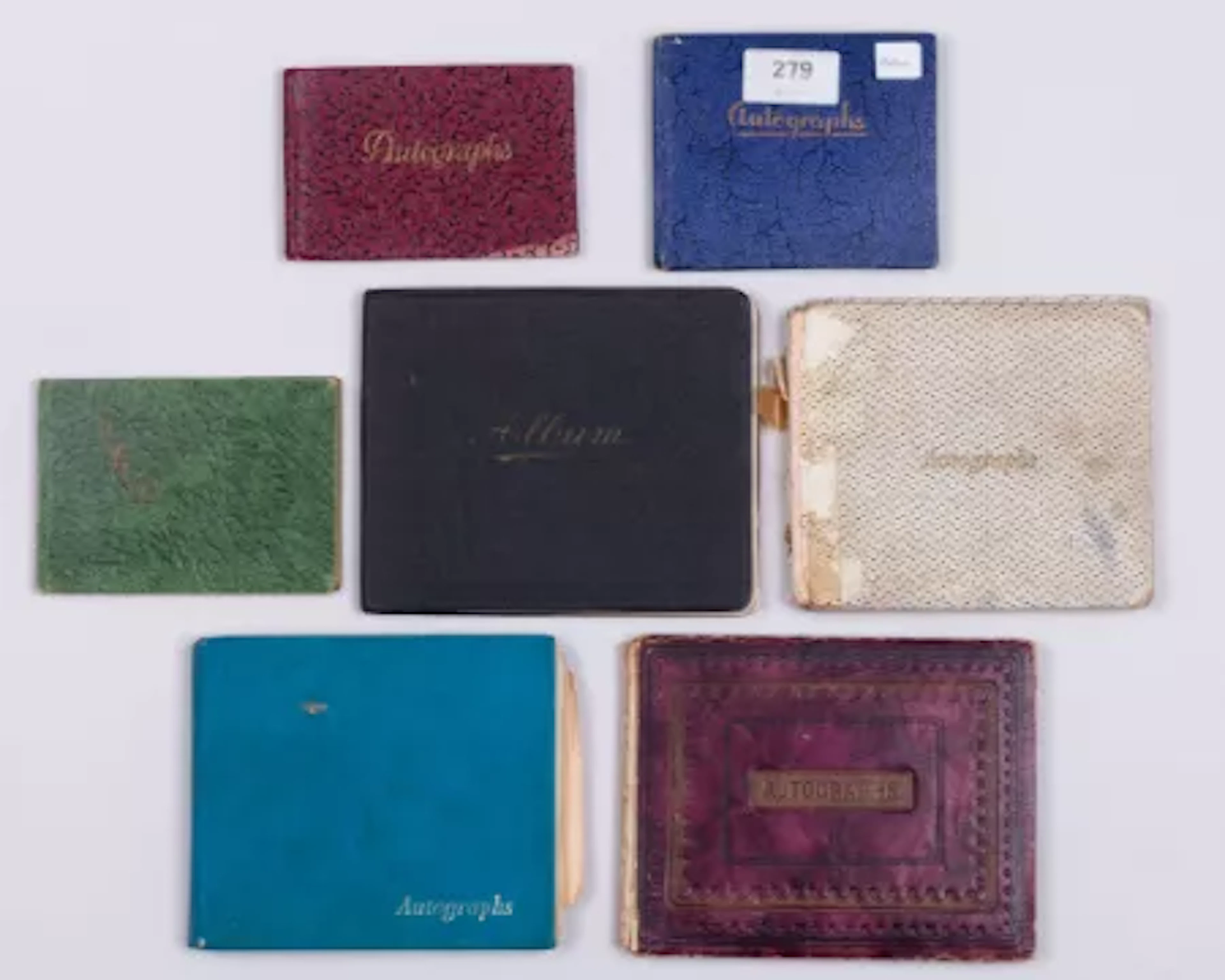 Seven cricket autograph books