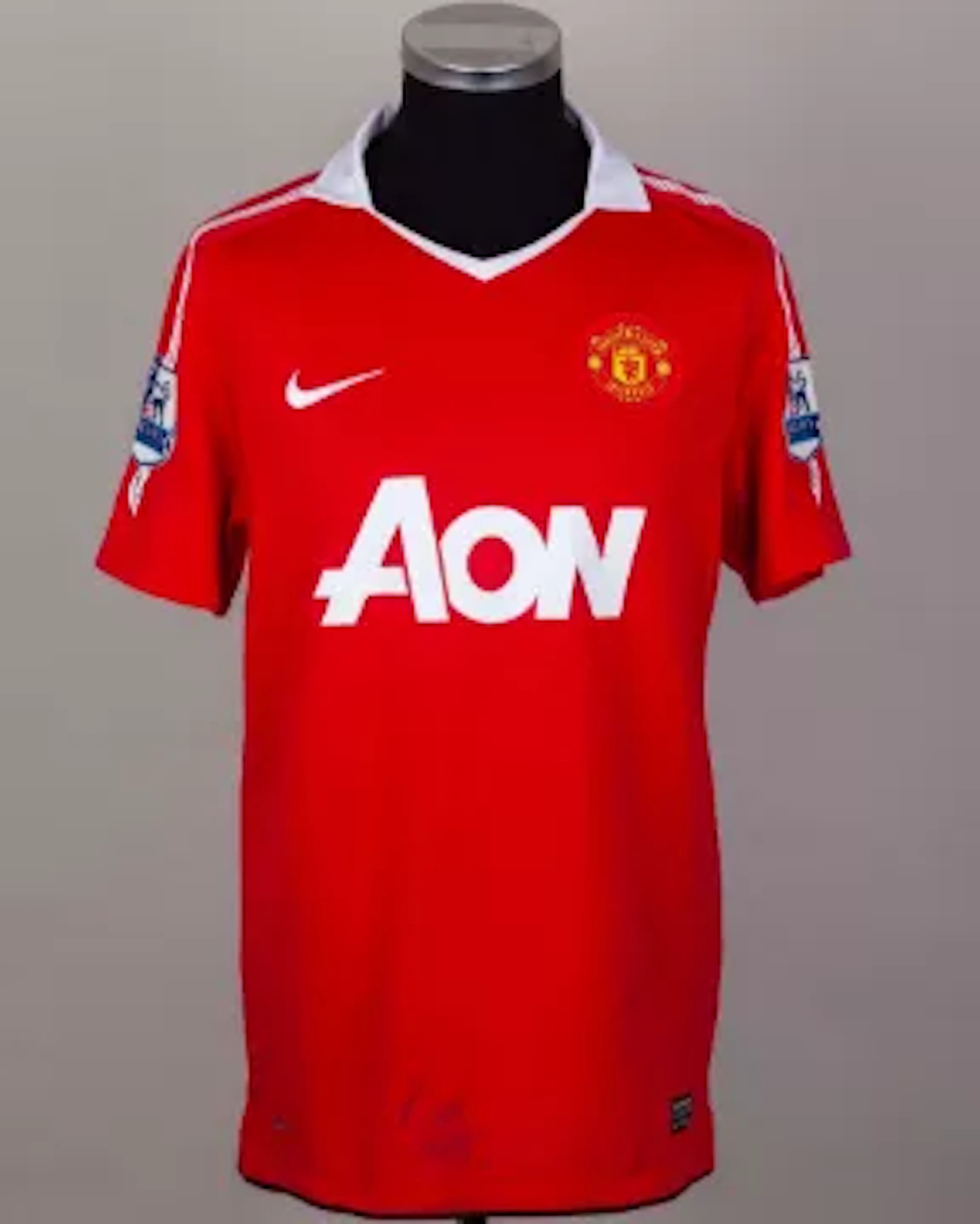 Wayne Rooney red No.10 Manchester United match-worn short sleeved shirt, 2011