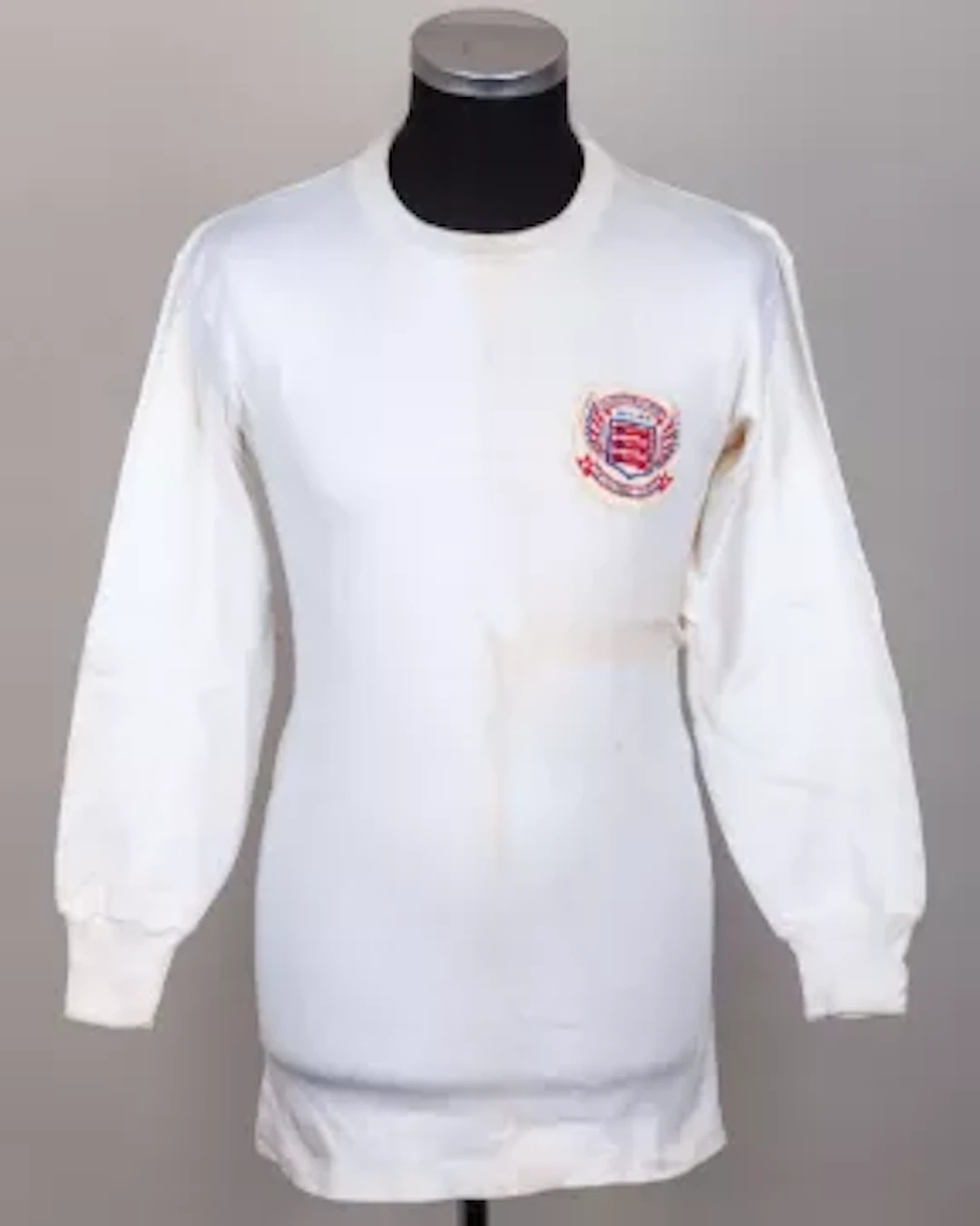 Emlyn Hughes a white No.3 Football League match worn long-sleeved shirt, 1970