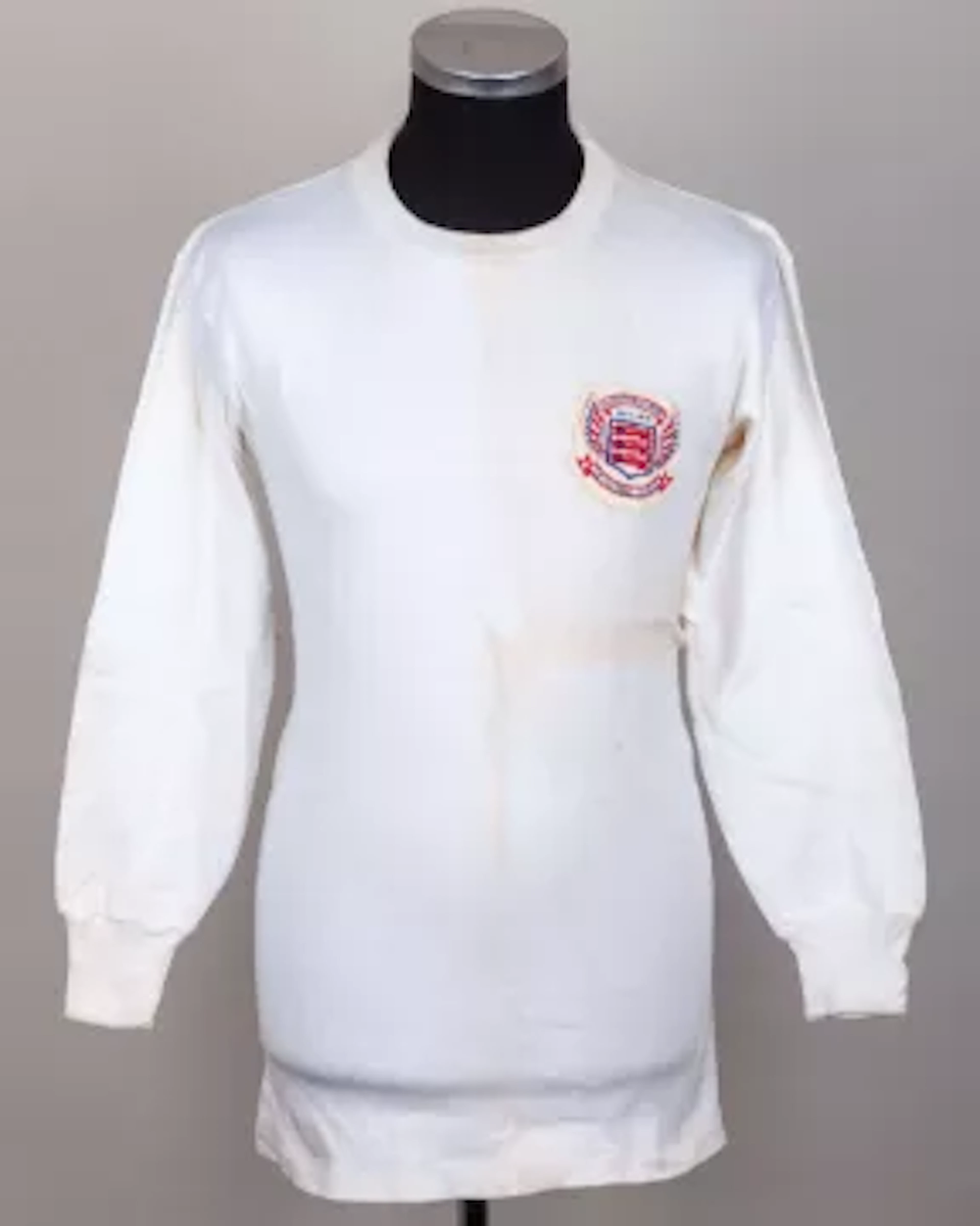 Emlyn Hughes a white No.3 Football League match worn long-sleeved shirt, 1970