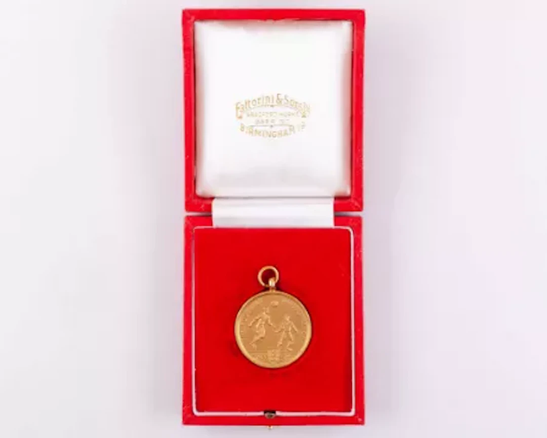 Emlyn Hughes a 9ct gold Liverpool v. Arsenal F.A.Cup runners-up medal, 1971