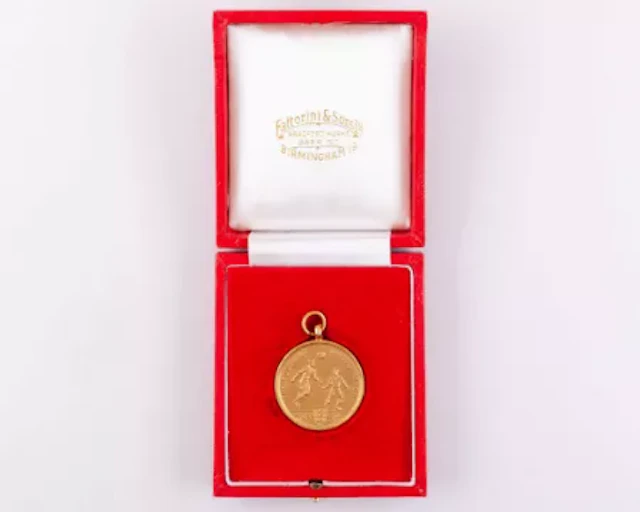 Emlyn Hughes a 9ct gold Liverpool v. Arsenal F.A.Cup runners-up medal, 1971