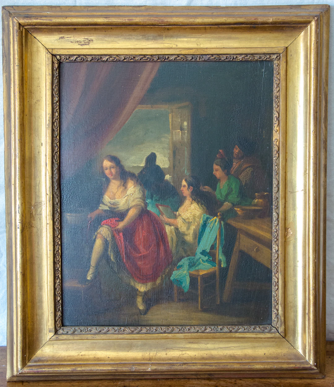 Ecole espagnole du XIXe siècle - Jeune femme à sa toilette -.Huile sur panneau