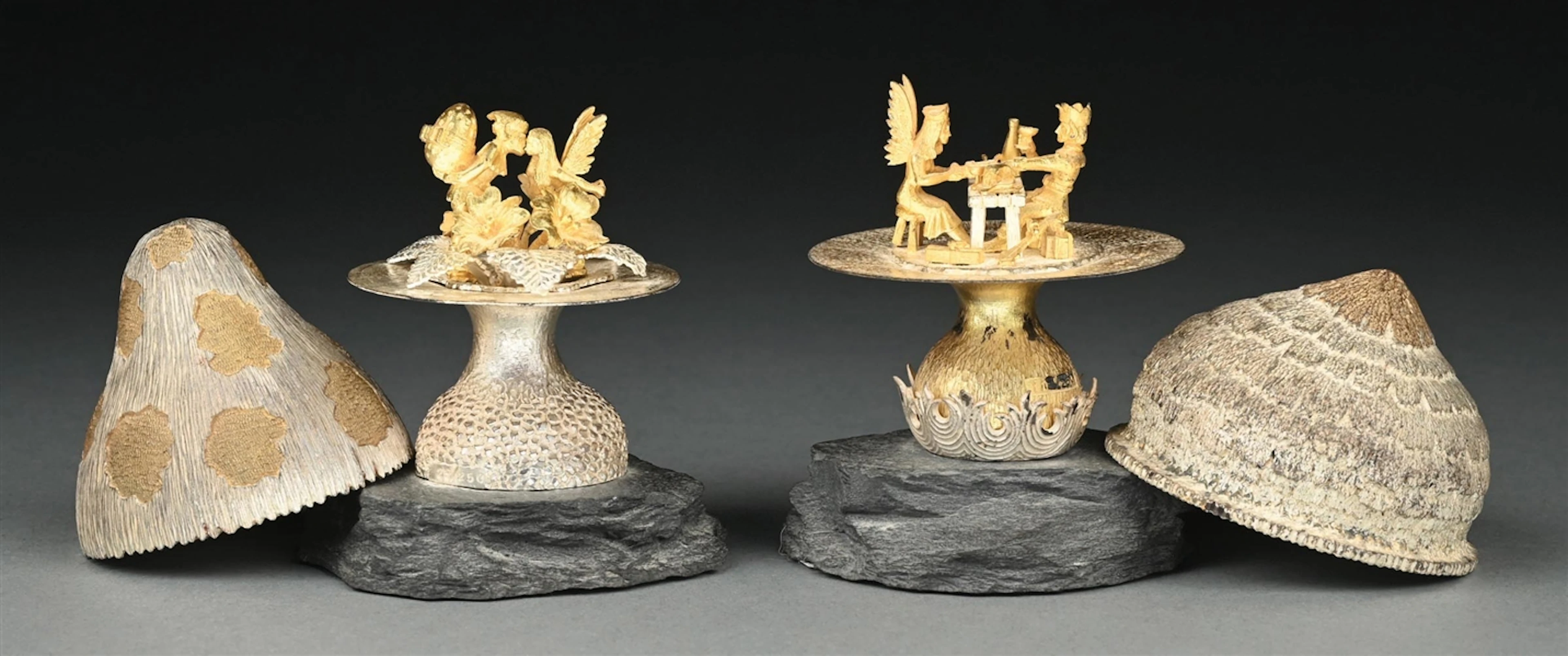 A PAIR OF SILVER MUSHROOMS ON SLATE BASES
