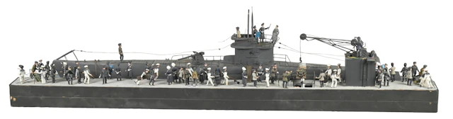 CUSTOM-MADE GERMAN U-BOAT MODEL AT PORT WITH SOLDIER FIGURES IN WOODEN CRATE