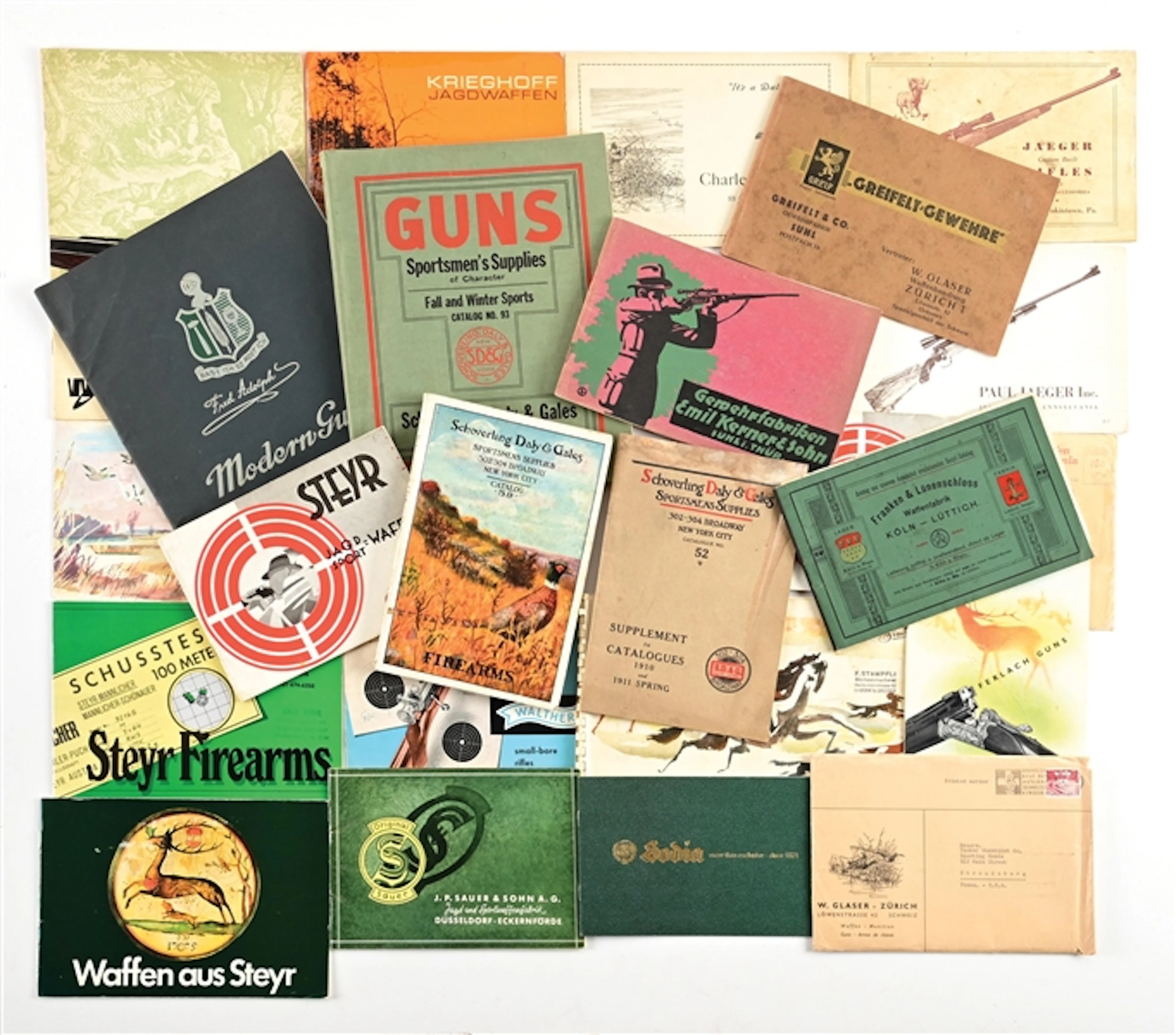 LARGE LOT OF 24 VINTAGE GERMAN GUN CATALOGS AND PAPER.