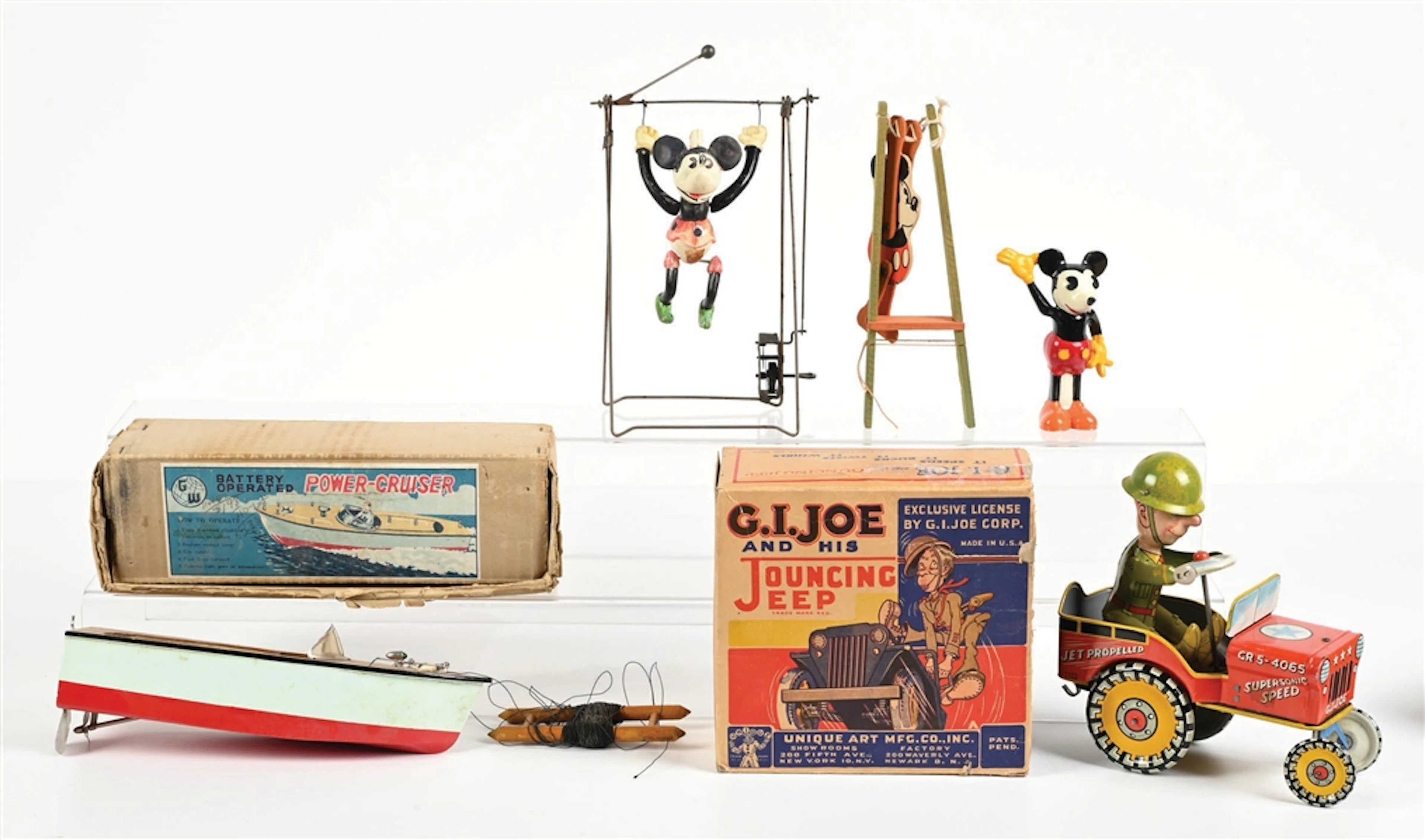 COLLECTION OF 4: VARIOUS AMERICAN & JAPANESE-MADE TIN & CELLULOID TOYS