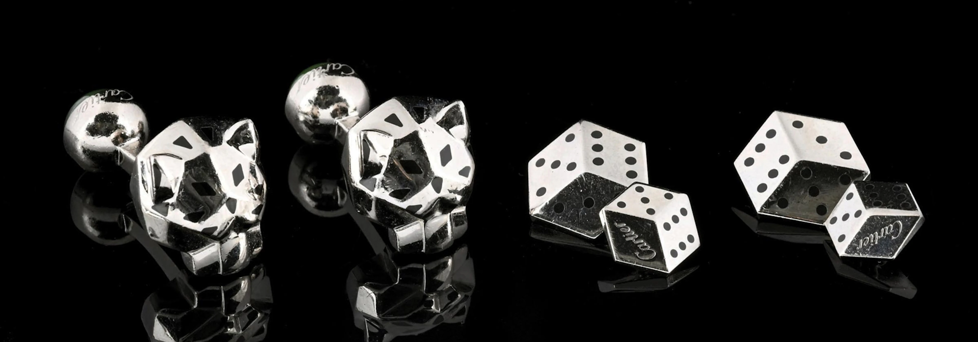 TWO PAIR OF CARTIER STERLING SILVER CUFFLINKS