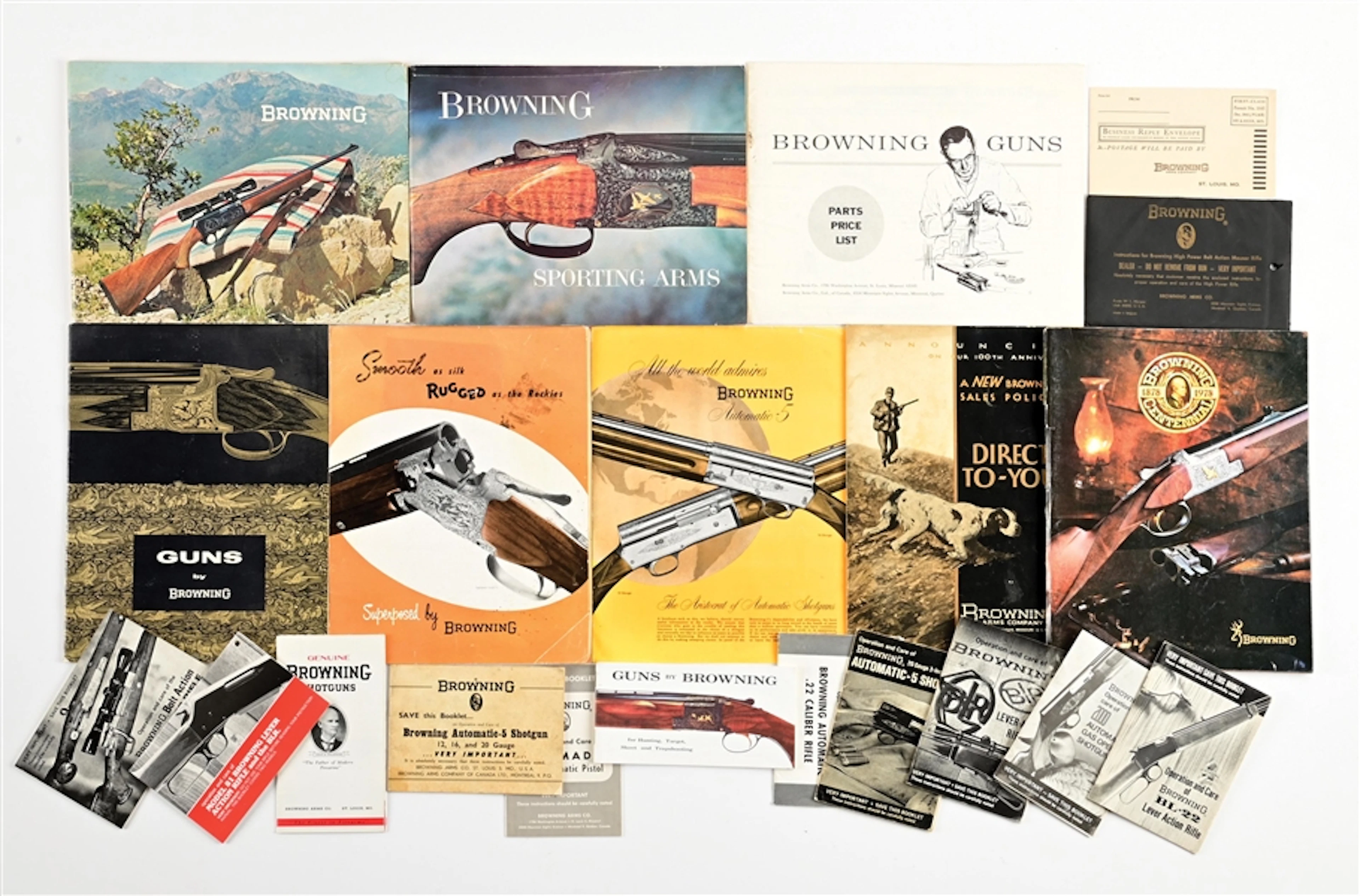 LOT OF 20 VINTAGE BROWNING CATALOGS AND MANUALS.