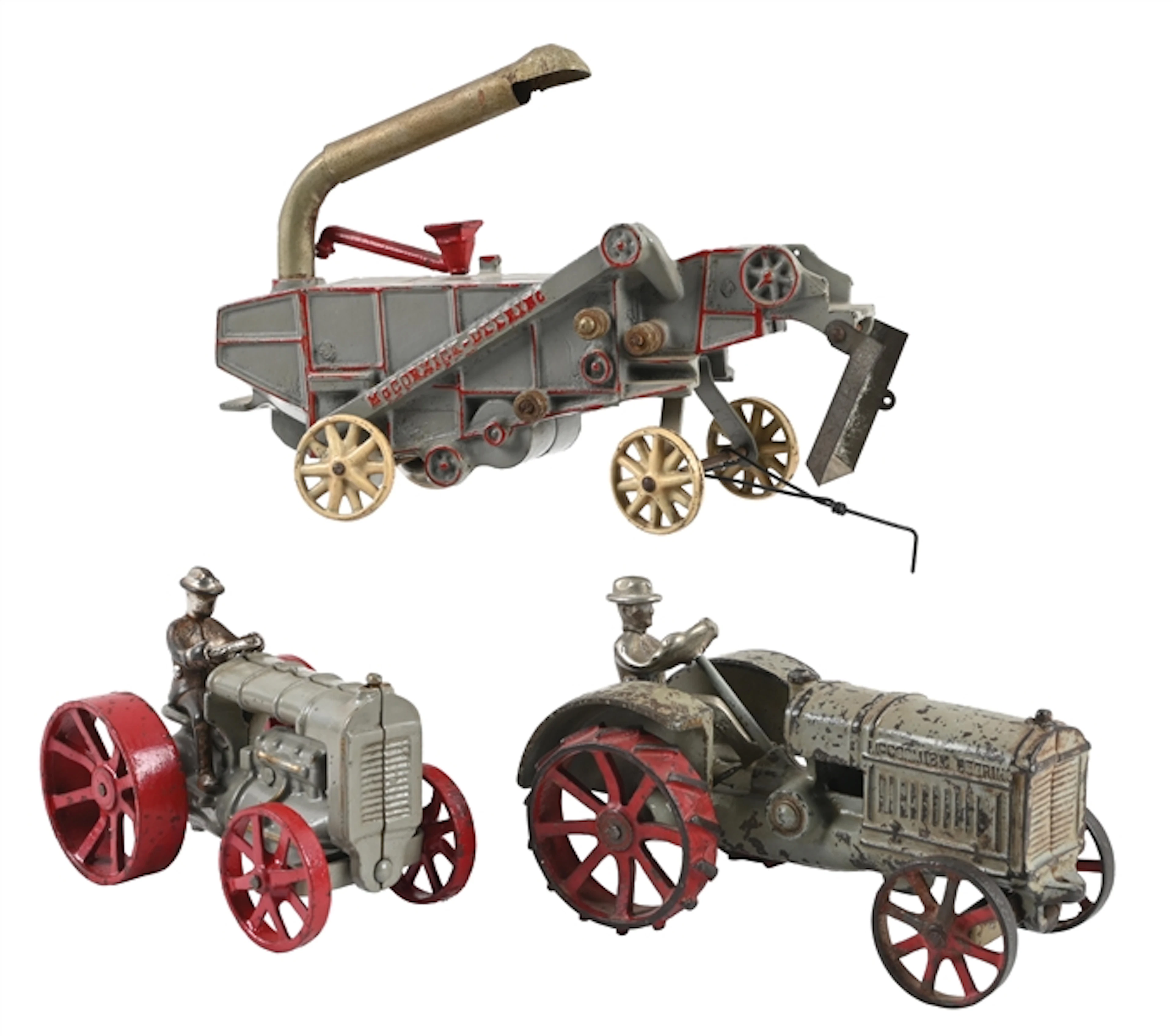 LOT OF 3: ARCADE MFG. CO. MCCORMICK-DEERING CAST IRON TOY TRACTORS