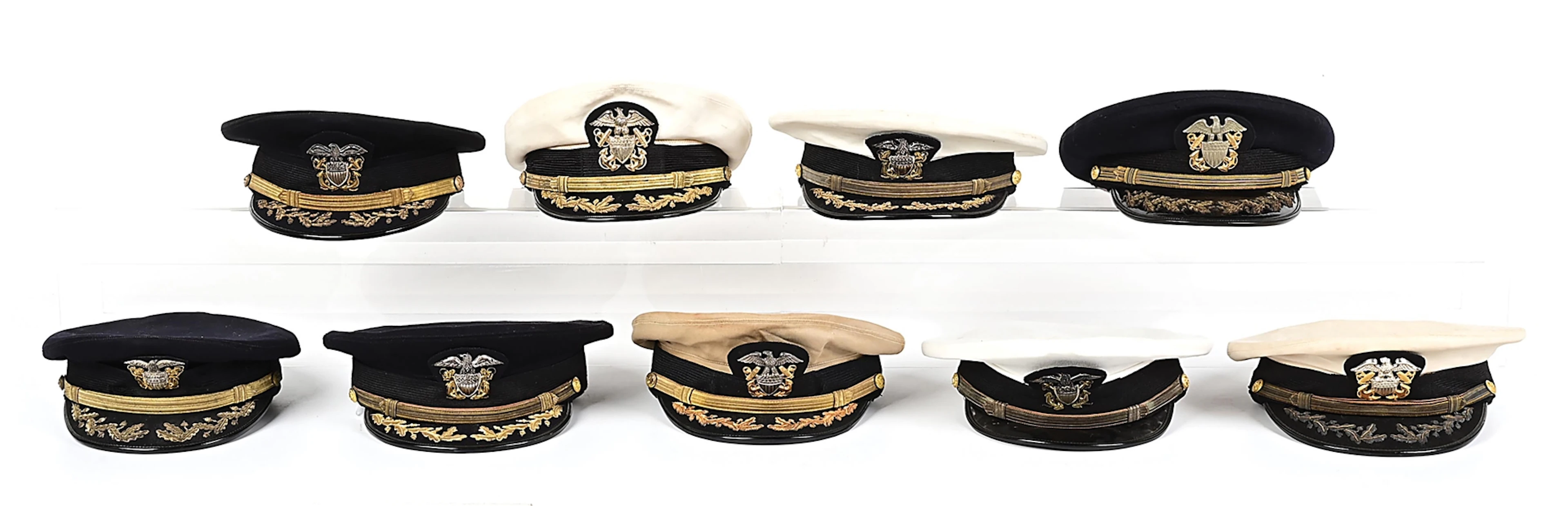 LOT OF U.S. NAVY OFFICER VISORS CAPS.